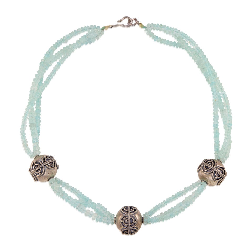 SILVER AND AQUAMARINE NECKLACE: SILVER AND AQUAMARINE NECKLACE • Silver • Numerous aquamarine beads measuring approximately 4.36mm in diameter • Length 17 in. • Estimated gross weight: 67.4