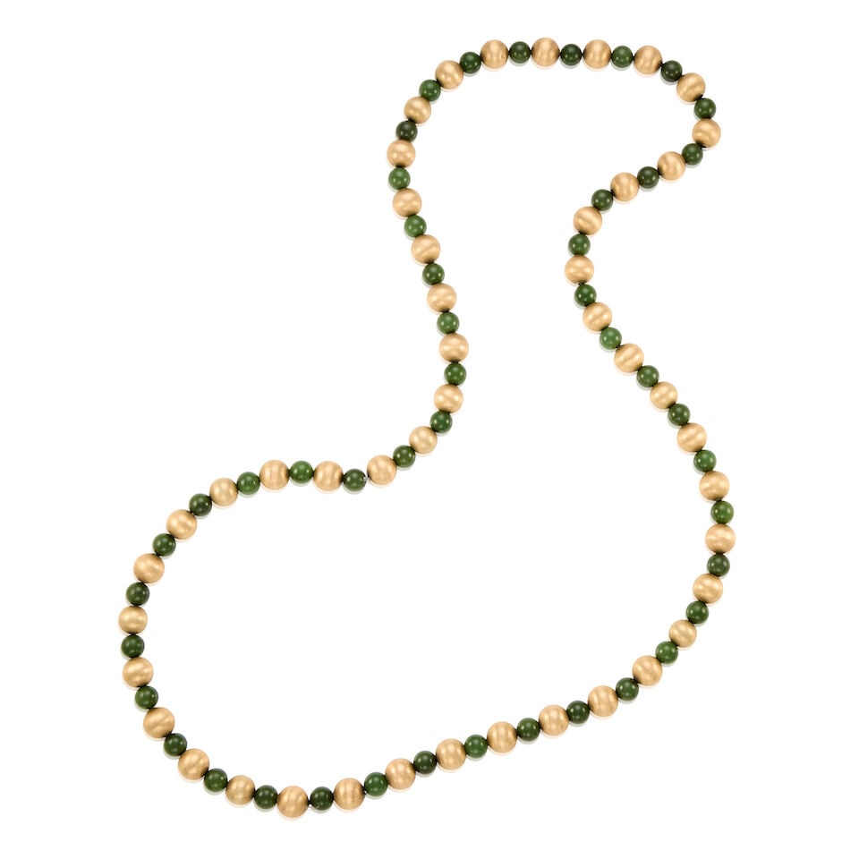14K GOLD AND SERPENTINE NECKLACE: 14K GOLD AND SERPENTINE NECKLACE • 14K yellow gold beads • Numerous serpentine beads measuring approximately 9.00mm in diameter • Length 18 in., no clasp • Estimated gross weig