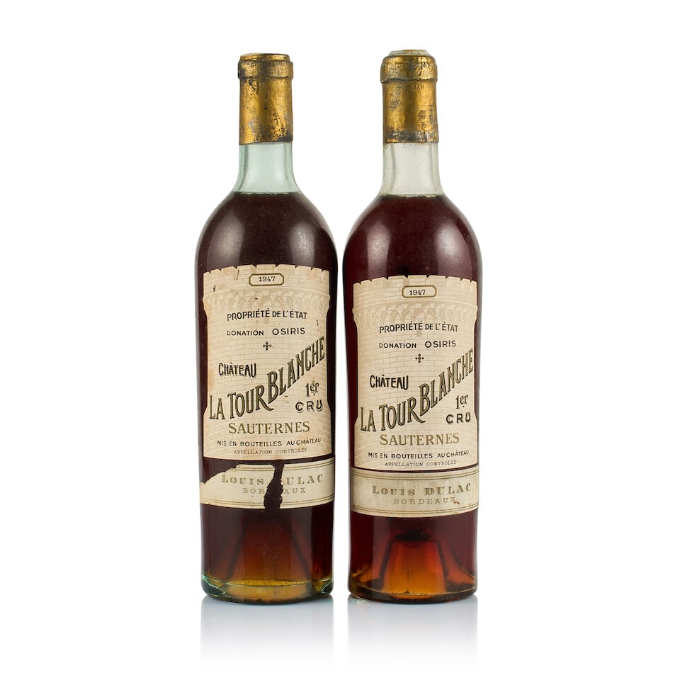 Château La Tour Blanche, Sauternes, 1er Grand Cru Classé, 1947 (2 x 750ml): Château La Tour Blanche, Sauternes, 1er Grand Cru Classé, 1947 (2 x 750ml) Region: Bordeaux Fill Level: 2x top shoulder Capsule: 2x bin-soiled and corroded Cork: 1x raised, 1x ok Label: all 