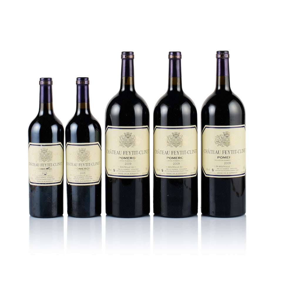 Château Feytit-Clinet, Pomerol, 2005 & 2009 (2 x 750ml & 3 x Magnum): Château Feytit-Clinet, Pomerol, 2005 (2 x 750ml) Region: Bordeaux Fill Level: 2x base of neck Capsule: ok Cork: slightly depressed Label: 1x slightly scratched, 1x stained and scratched Packaging