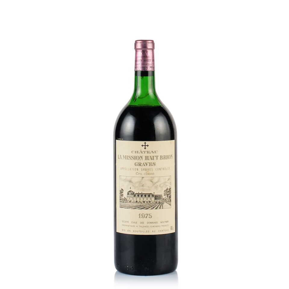 Château la Mission Haut-Brion, Pessac-Léognan, Grand Cru Classé, 1975 (1 x Magnum): Château la Mission Haut-Brion, Pessac-Léognan, Grand Cru Classé, 1975 (1 x Magnum) Region: Bordeaux Fill Level: mid-shoulder Capsule: ok Cork: ok Label: stained and very slightly