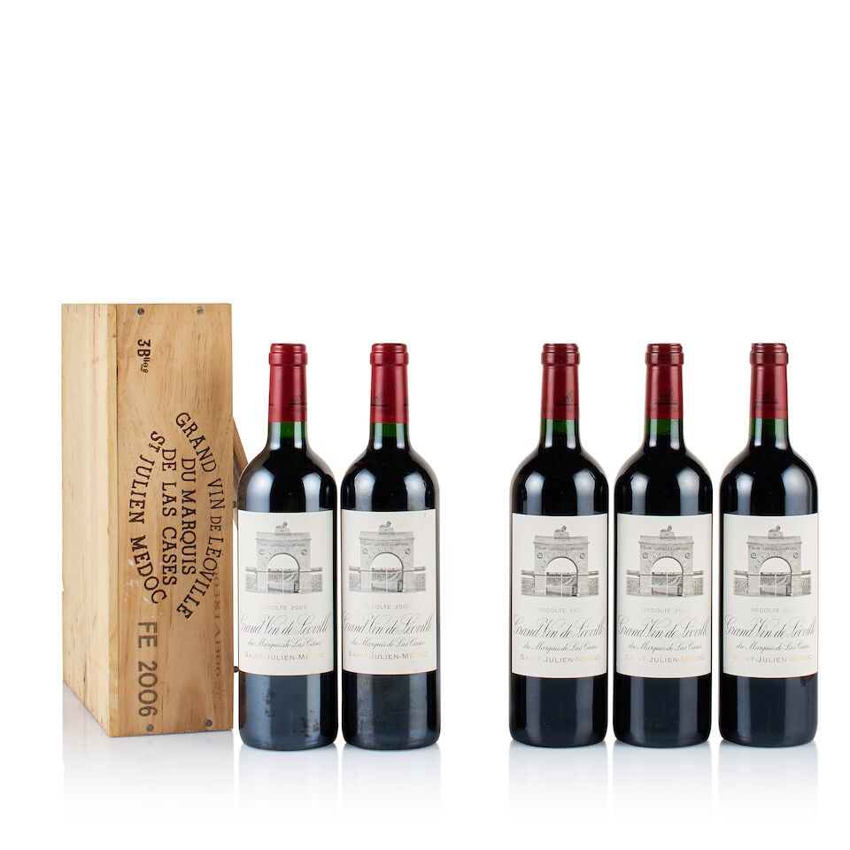 Château Léoville Las Cases, Saint-Julien, Grand Cru Classé, 2005 & 2006 (5 x 750ml): Château Léoville Las Cases, Saint-Julien, Grand Cru Classé, 2005 (2 x 750ml) Region: Bordeaux Fill Level: 2x base of neck Capsule: ok Cork: ok Label: 2x slightly stained Packaging: