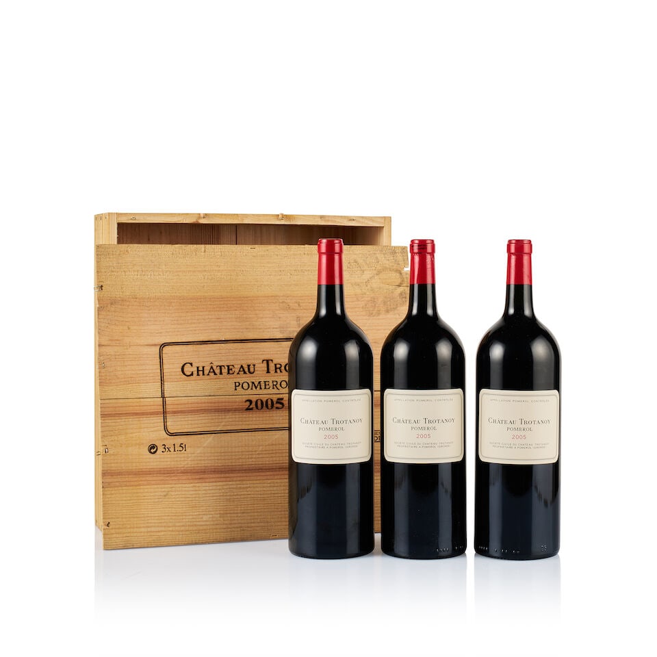Château Trotanoy, Pomerol, 2005 (3 x Magnum): Château Trotanoy, Pomerol, 2005 (3 x Magnum) Region: Bordeaux Fill Level: into neck Capsule: ok Cork: 3x very slightly depressed Label: excellent appearance Packaging: original wooden case