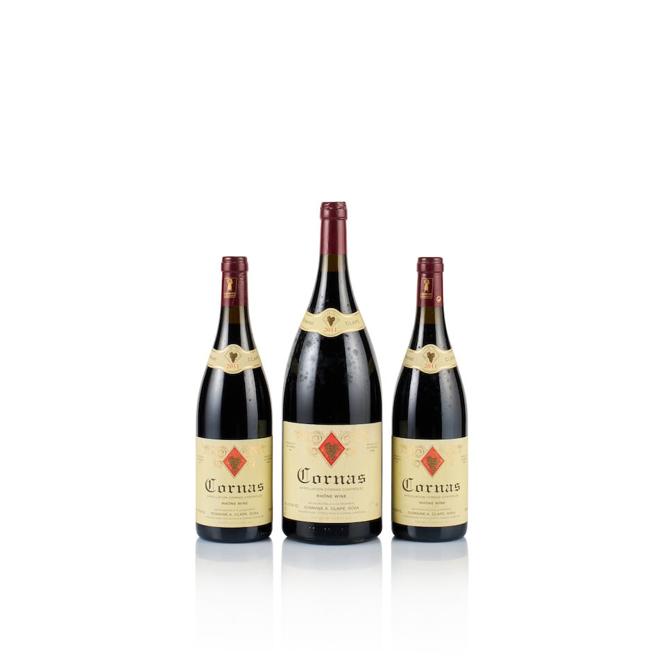 Domaine A. Clape, Cornas, 2011 (2 x 750ml & 1 x Magnum): Domaine A. Clape, Cornas, 2011 (2 x 750ml) Region: Rhône Valley Fill Level: 2x under 2cm below base of capsules Capsule: 2x corroded Cork: ok Label: 2x covered with dust and bin-soiled Packaging: