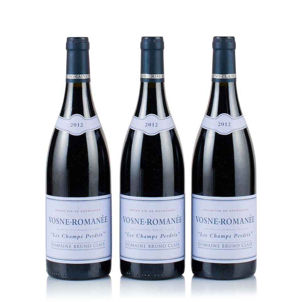 Domaine Bruno Clair, Vosne-Romanée, Les Champs Perdrix, 2012 (3 x 750ml): Domaine Bruno Clair, Vosne-Romanée, Les Champs Perdrix, 2012 (3 x 750ml) Region: Burgundy Fill Level: good Capsule: ok Cork: 1x very slightly depressed, 2x ok Label: 2x excellent appearance, 1x c