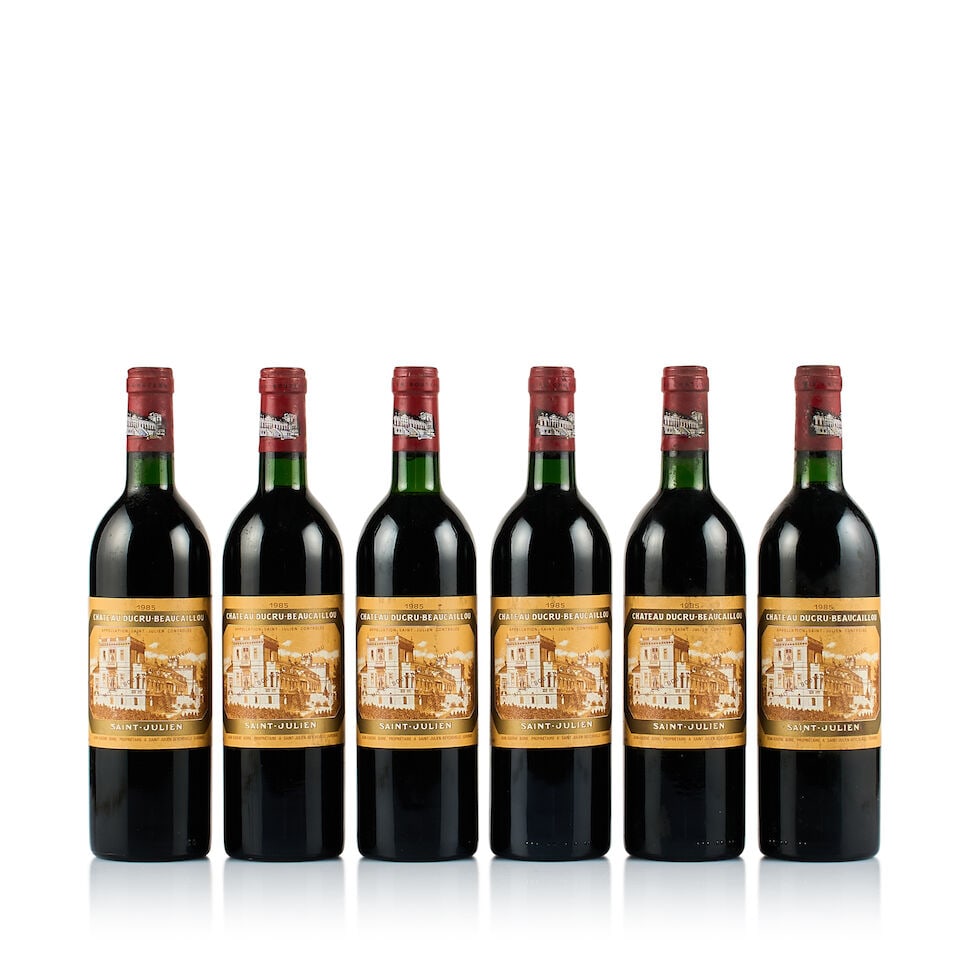 Château Ducru-Beaucaillou, Saint-Julien, Grand Cru Classé, 1985 (6 x 750ml): Château Ducru-Beaucaillou, Saint-Julien, Grand Cru Classé, 1985 (6 x 750ml) Region: Bordeaux Fill Level: 1x very top shoulder, 5x base of neck Capsule: 6x bin-soiled Cork: 6x depressed Label