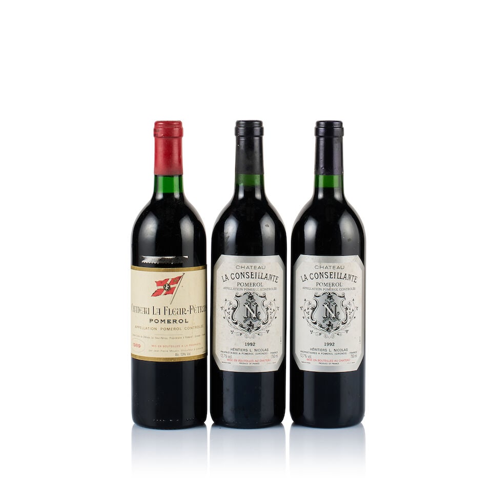 Mixed Lot of Pomerol, 1989 & 1992 (3 x 750ml): Château La Fleur-Pétrus, Pomerol, 1989 (1 x 750ml) Region: Bordeaux Fill Level: into neck Capsule: ok Cork: very slightly depressed Label: very slightly scuffed at the bottom left and slight