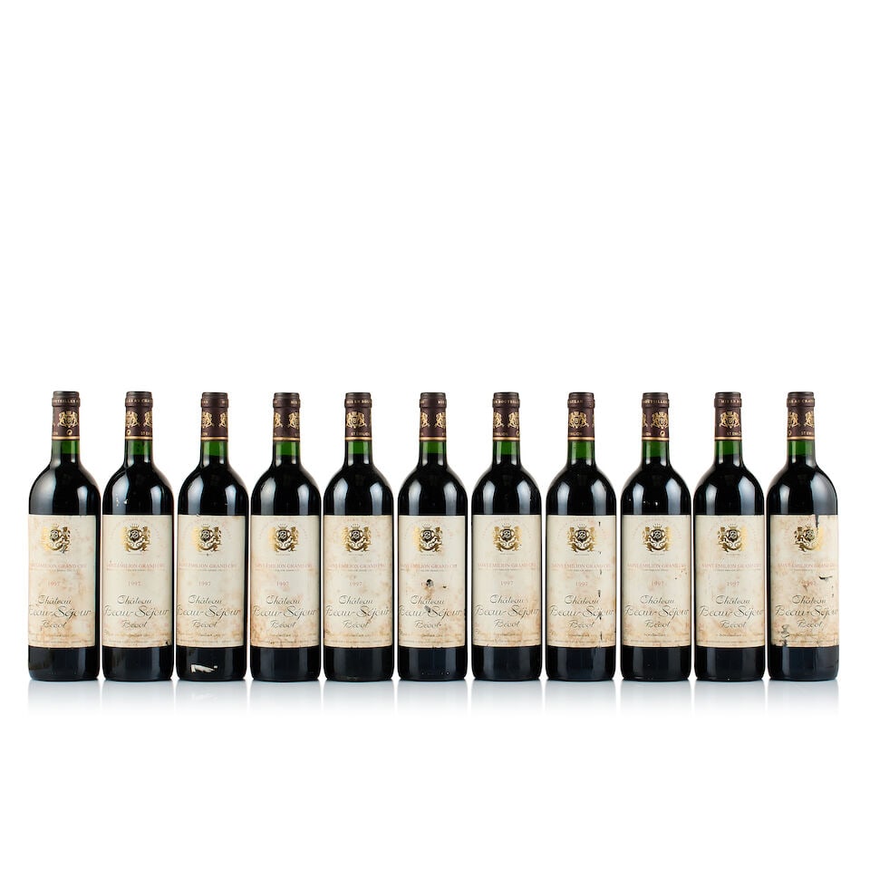 Château Beau-Séjour Bécot, Saint-Emilion Grand Cru, 1997 (11 x 750ml): Château Beau-Séjour Bécot, Saint-Emilion Grand Cru, 1997 (11 x 750ml) Region: Bordeaux Fill Level: 11x into neck Capsule: 11x slightly bin-soiled Cork: 1x slightly depressed, 10x ok Lab