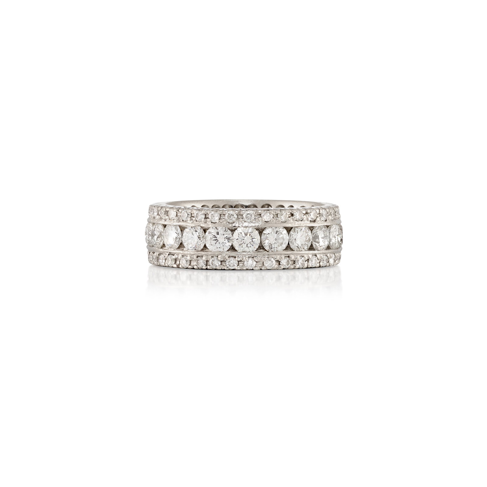A DIAMOND RING: A DIAMOND RING An eternity band comprising three rows of round brilliant-cut diamonds; estimated total diamond weight 3.65 carats; mounted in platinum; size 9 Footnotes: OVERALL CONDITION: Metal