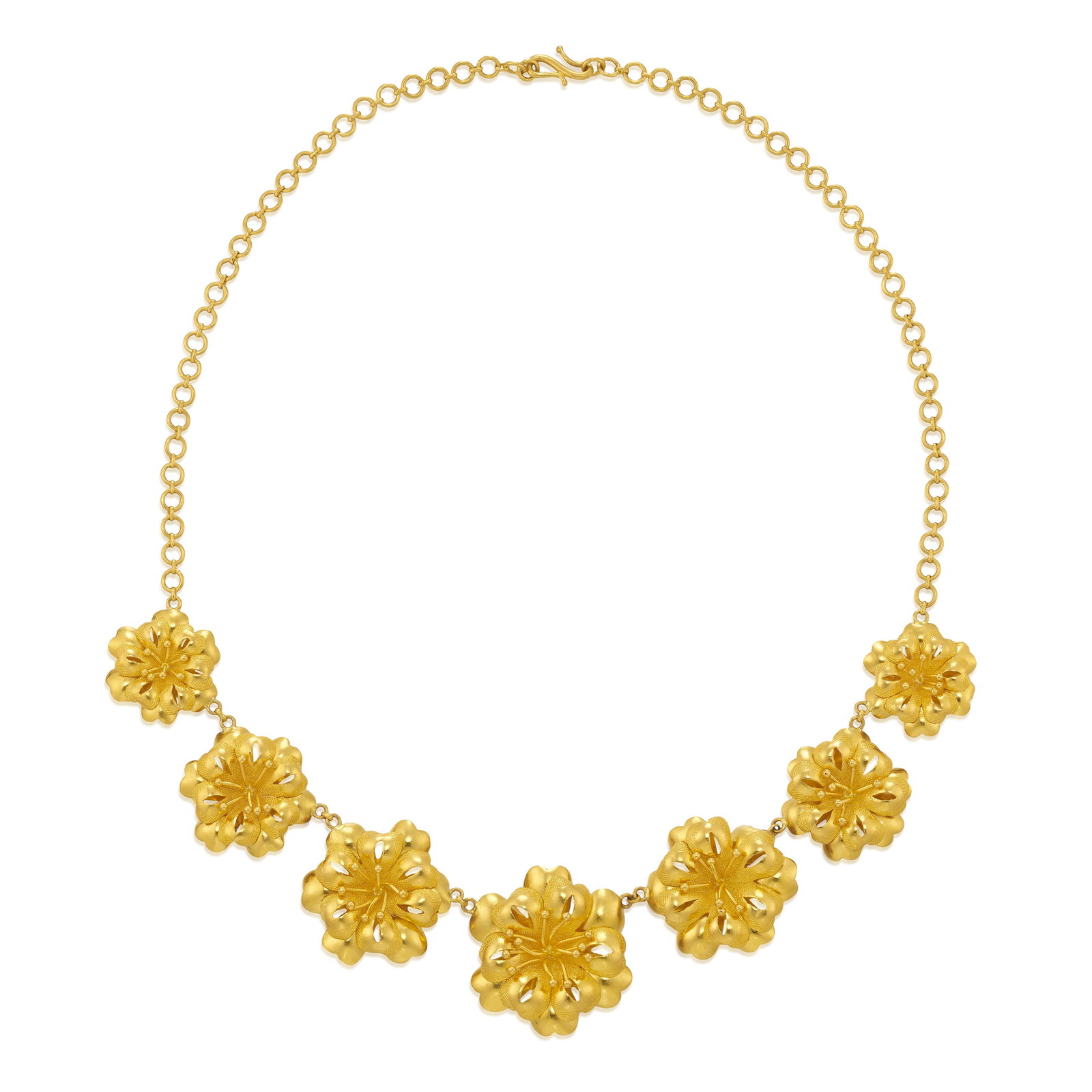A GOLD NECKLACE: A GOLD NECKLACE Comprising graduated, dimensional flowers, completed by a round link backchain; with maker's and/or assay marks; fabricated in 23k gold; length 17 3/4 in., elements measure 13/16 - 1