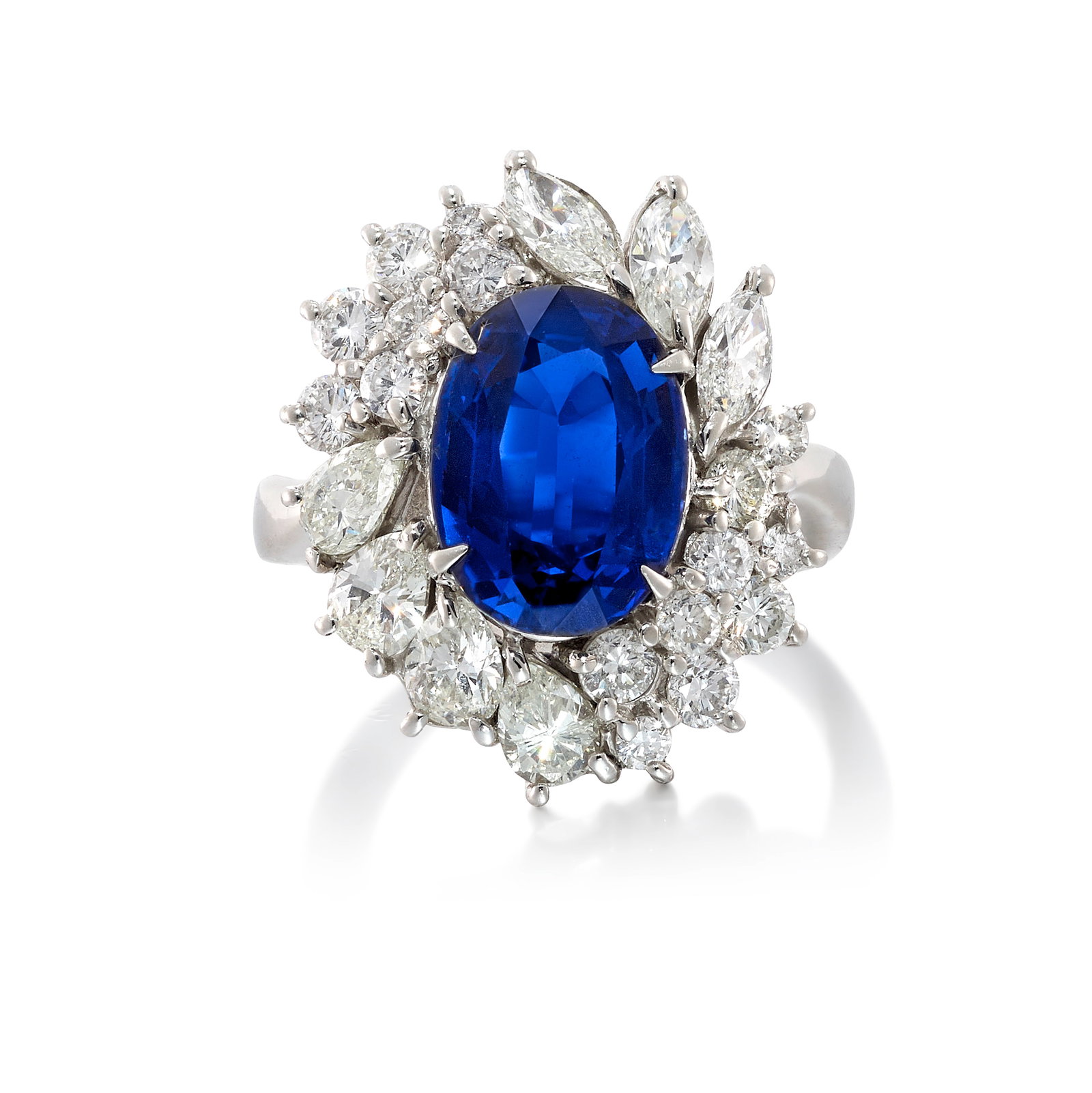 A PLATINUM, SAPPHIRE AND DIAMOND RING (1 of 1)