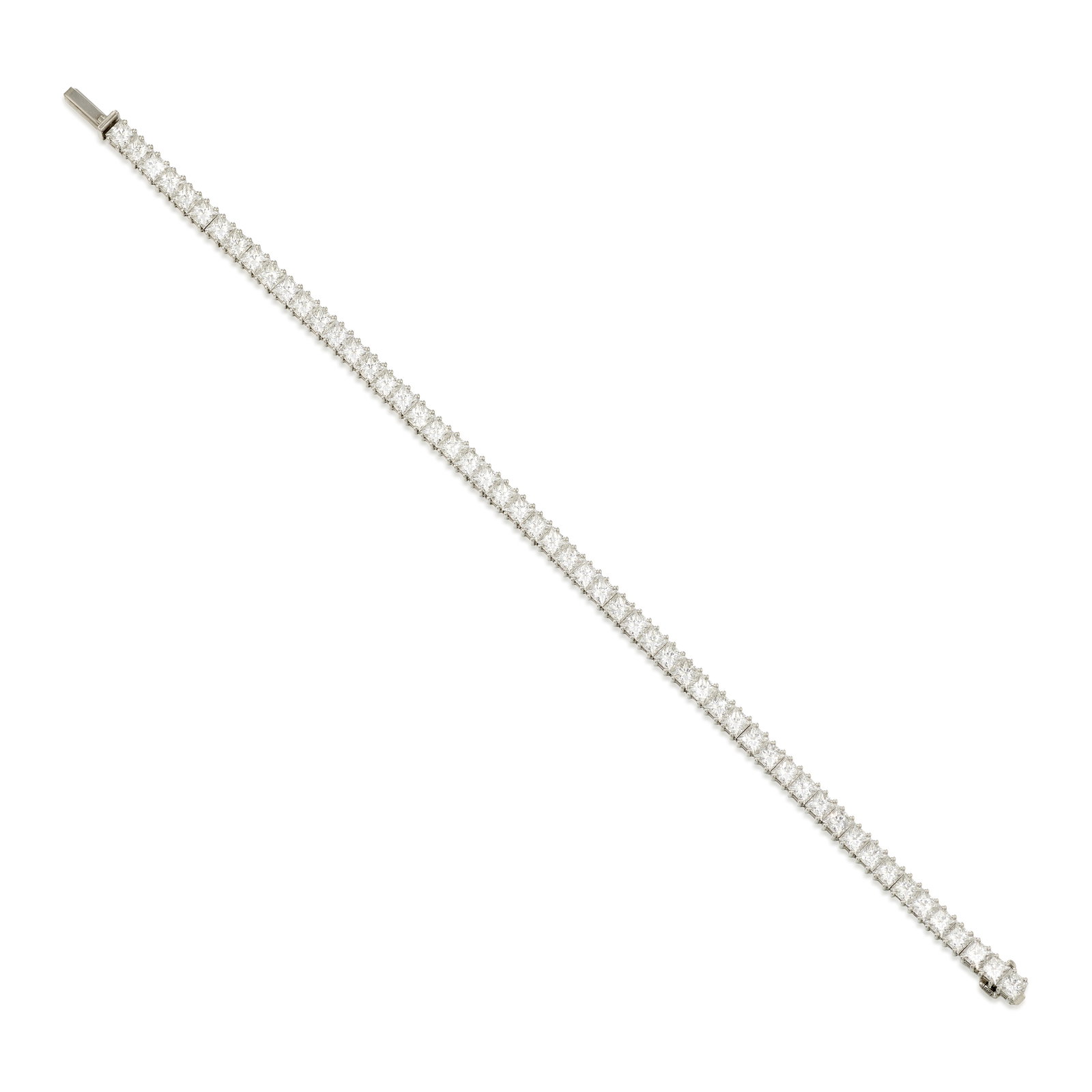 DE BEERS: A PLATINUM AND DIAMOND BRACELET: DE BEERS: A PLATINUM AND DIAMOND BRACELET A line bracelet comprising square brilliant-cut diamonds; signed De Beers; with English hallmarks, Birmingham; with serial number; estimated total diamond wei