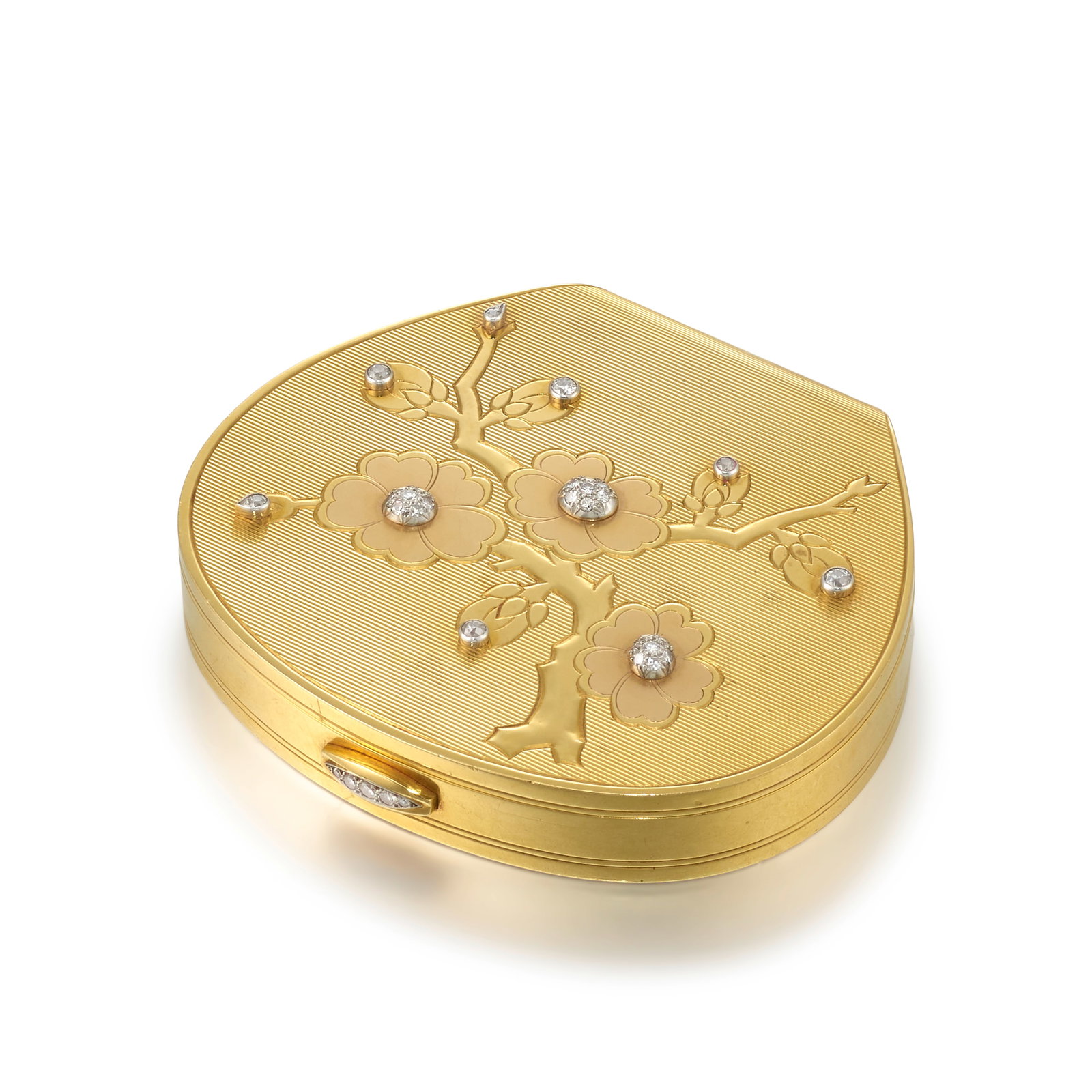 CARTIER: AN 18K TRICOLOR GOLD AND DIAMOND COMPACT, LONDON, CIRCA 1950: CARTIER: AN 18K TRICOLOR GOLD AND DIAMOND COMPACT, LONDON, CIRCA 1950 The case of patterned gold, with an engraved floral motif, accented with clusters of old mine and single-cut diamonds, a beveled e