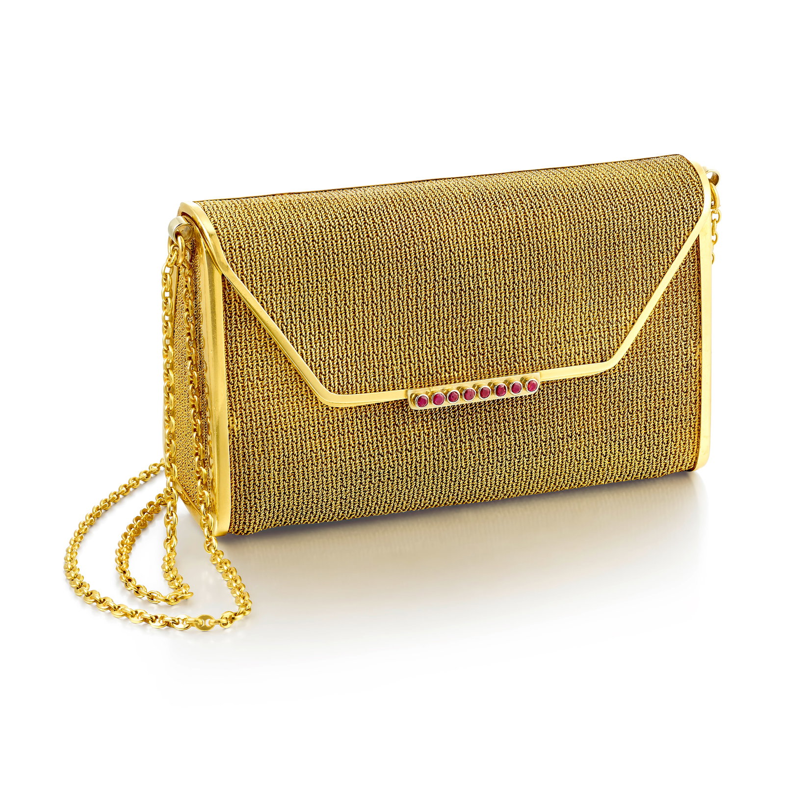 AN 18K GOLD AND RUBY PURSE, CIRCA 1950: AN 18K GOLD AND RUBY PURSE, CIRCA 1950 Comprising a woven gold body and frame, accented with round rubies at clasp, completed by a marine chain strap; with Italian registered trademark; measures 4 3/4