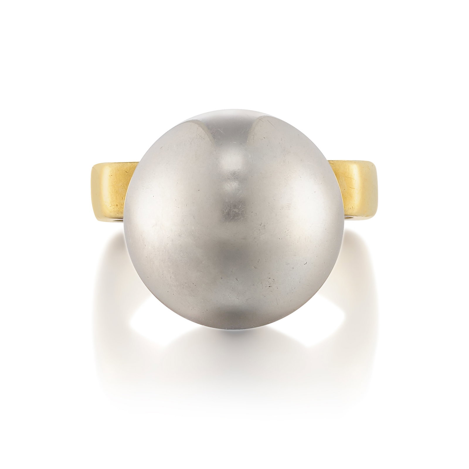 DINH VAN FOR CARTIER: AN 18K GOLD AND STAINLESS STEEL RING, CIRCA 1970: DINH VAN FOR CARTIER: AN 18K GOLD AND STAINLESS STEEL RING, CIRCA 1970 Of sculptural design, comprising a stainless steel ball mounted atop a square shank band; partial Cartier signature; partial Dinh