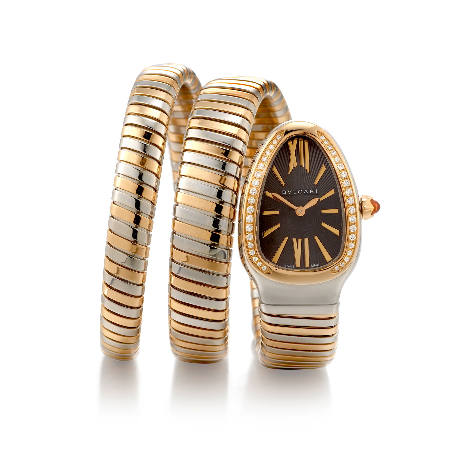 BULGARI: AN 18K PINK GOLD, STAINLESS STEEL AND DIAMOND 'SERPENTI' WRISTWATCH: BULGARI: AN 18K PINK GOLD, STAINLESS STEEL AND DIAMOND 'SERPENTI' WRISTWATCH Designed with quartz movement, the modified oval-shaped dial signed Bulgari, with Roman numeral and stick hour markers, the