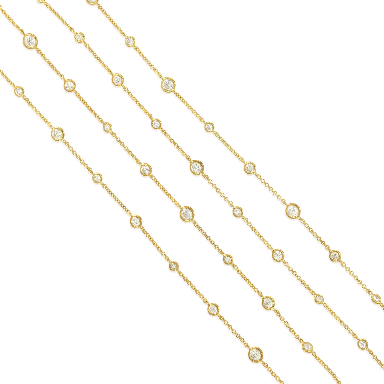 A DIAMOND NECKLACE: A DIAMOND NECKLACE A longchain comprising stations of round brilliant-cut diamonds; estimated total diamond weight 14.60 carats; mounted and fabricated in 14k gold; length 61 in. Footnotes: OVERALL