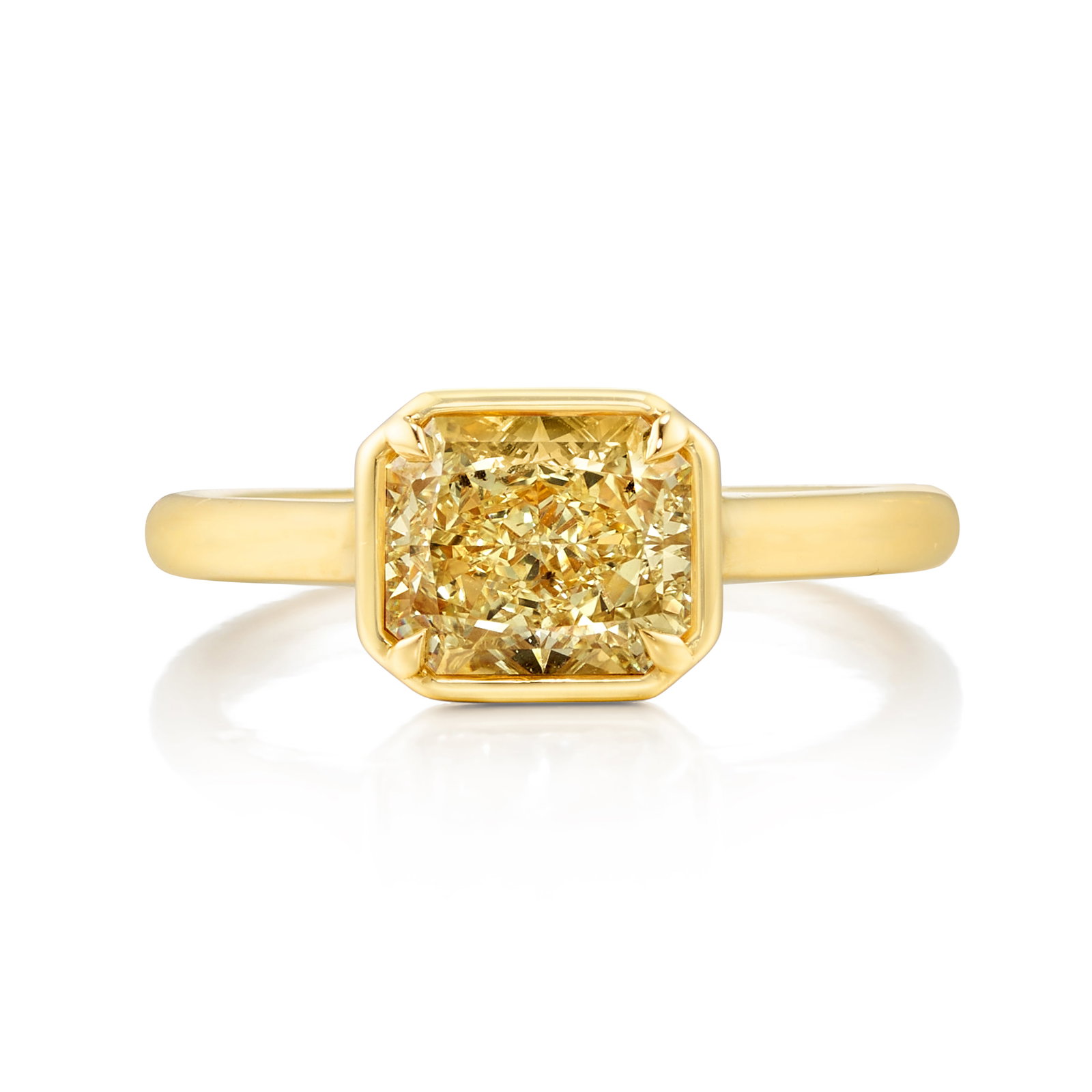 A DIAMOND RING: A DIAMOND RING Centering a cut-cornered rectangular, modified brilliant-cut diamond, weighing 2.03 carats; mounted in 18k gold; size 6 3/4 Footnotes: Accompanied by GIA Report 1232705007, dated