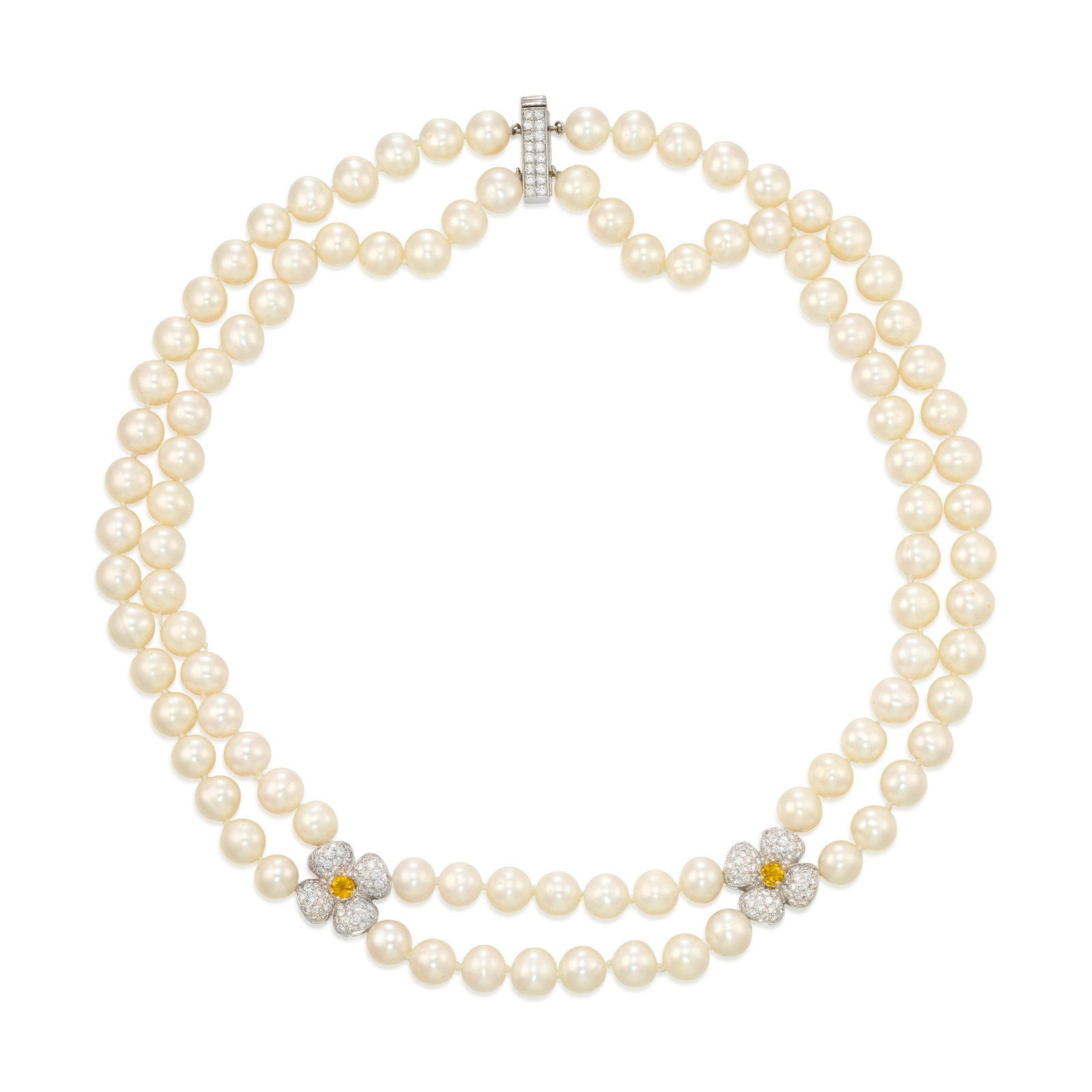 AN 18K WHITE GOLD, CULTURED PEARL, YELLOW SAPPHIRE AND DIAMOND NECKLACE: AN 18K WHITE GOLD, CULTURED PEARL, YELLOW SAPPHIRE AND DIAMOND NECKLACE Comprising two strands of round cultured pearls, gathered by stations designed as flowers, centering round yellow sapphires and