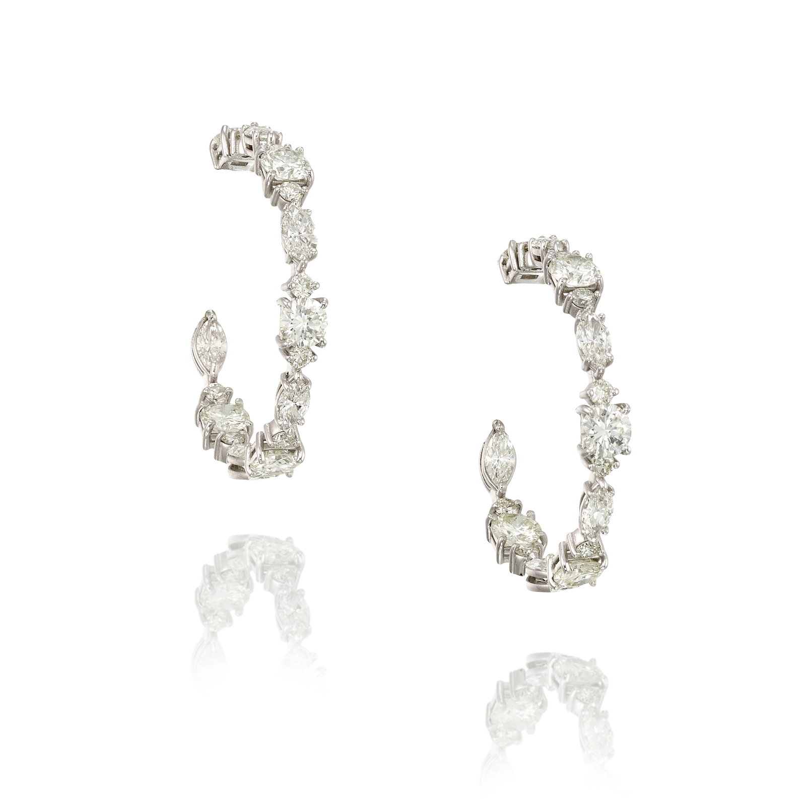 A PAIR OF 14K WHITE GOLD AND DIAMOND EARRINGS: A PAIR OF 14K WHITE GOLD AND DIAMOND EARRINGS Comprising round brilliant-cut and marquise-shaped diamonds; estimated total diamond weight 7.80 carats; measures 1 3/8 in. Footnotes: OVERALL CONDITION: