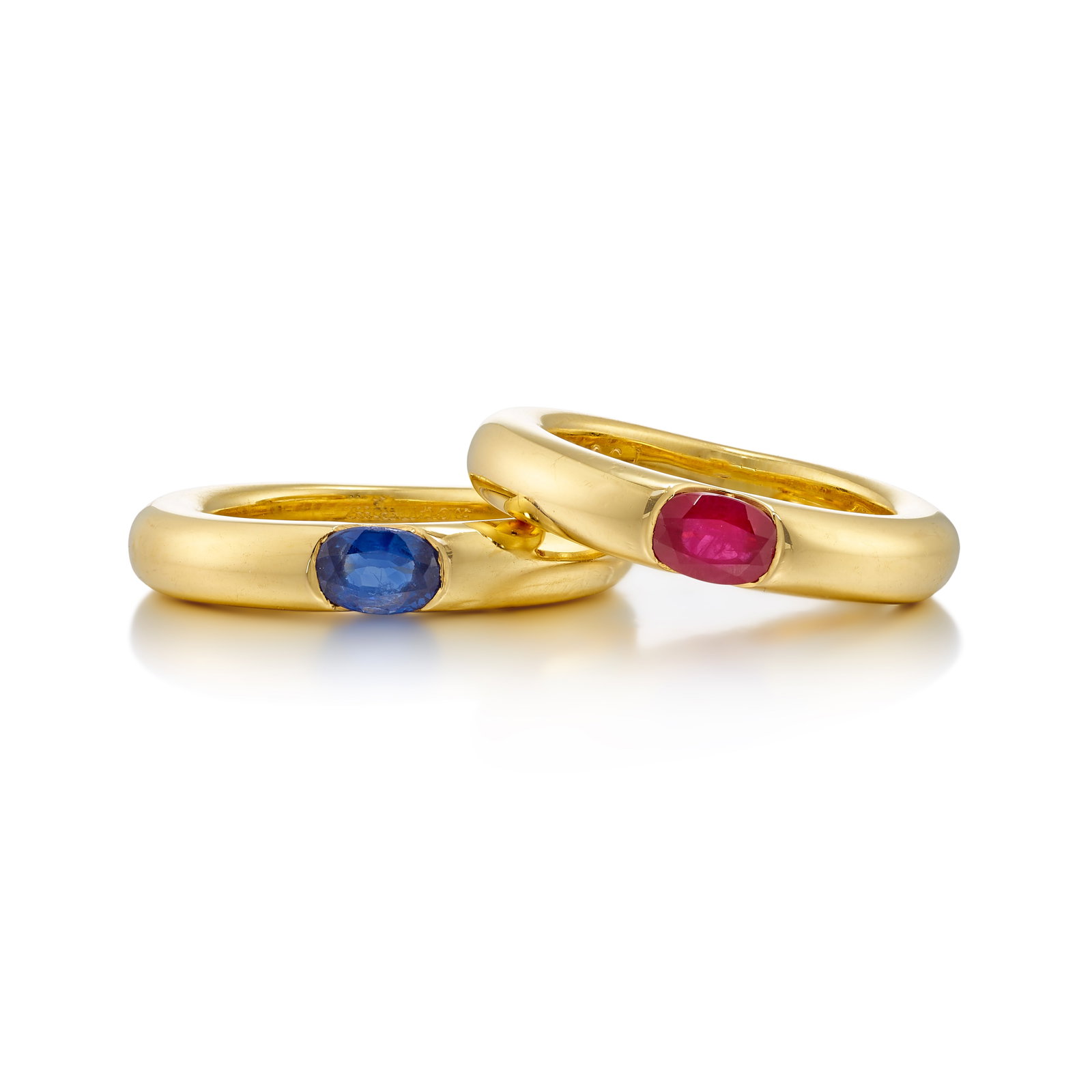 CARTIER: A SET OF 18K GOLD AND GEM-SET 'ELLIPSE' RINGS (1 of 1)