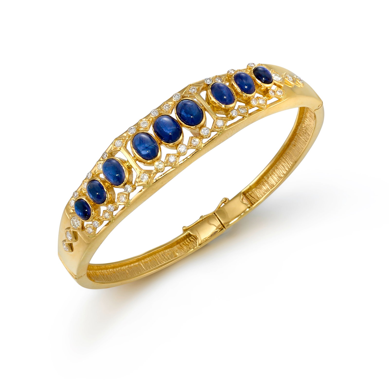 LALAOUNIS: AN 18K GOLD, SAPPHIRE AND DIAMOND BRACELET: LALAOUNIS: AN 18K GOLD, SAPPHIRE AND DIAMOND BRACELET A hinged bangle, set across the top with graduated oval-shaped cabochon sapphires, framed rows of round brilliant-cut diamonds; with maker's marks