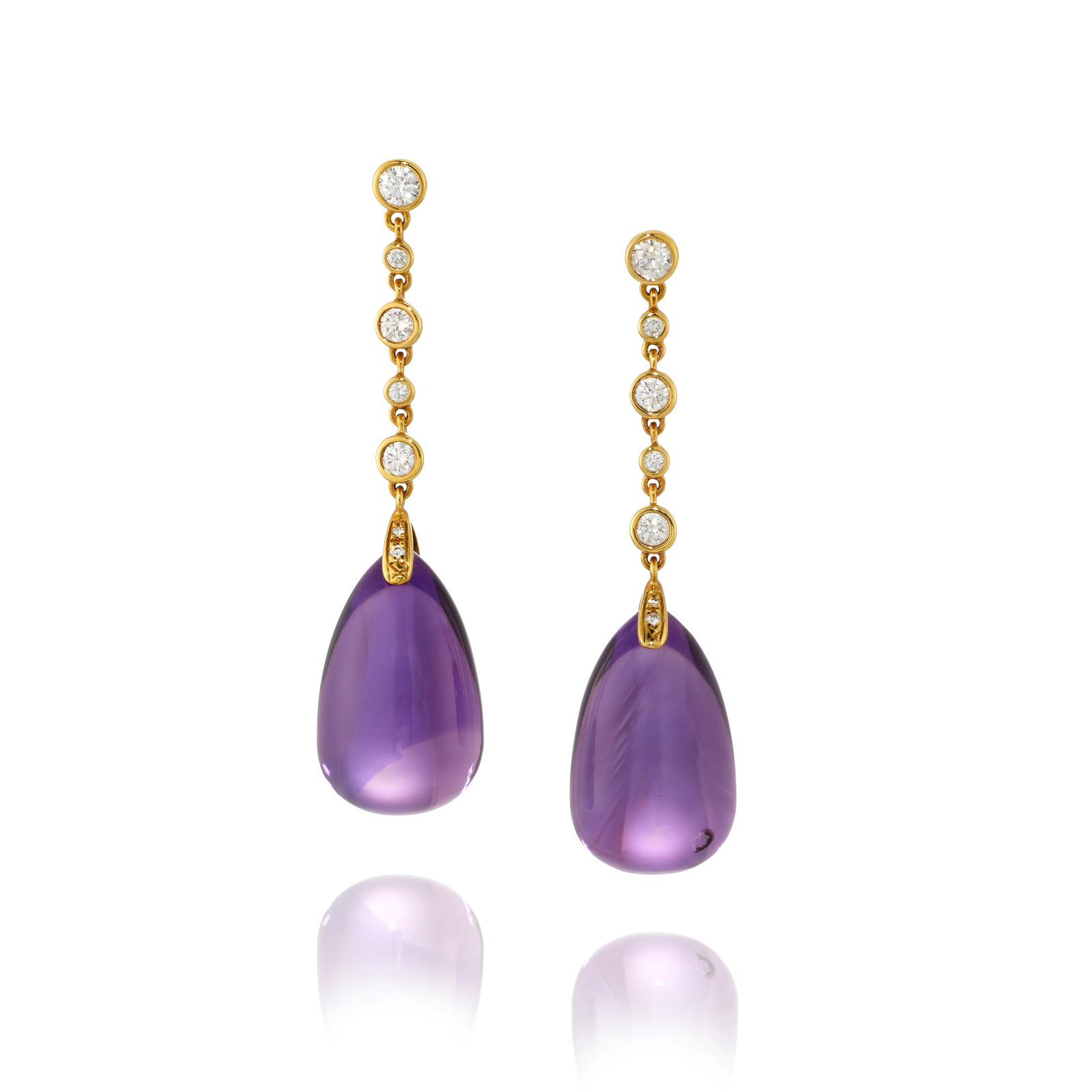 A PAIR OF AMETHYST AND DIAMOND EARRINGS: A PAIR OF AMETHYST AND DIAMOND EARRINGS Comprising pear-shaped amethyst drops, accented with round brilliant-cut diamonds; estimated total amethyst weight 50.00 carats; estimated total diamond weight 