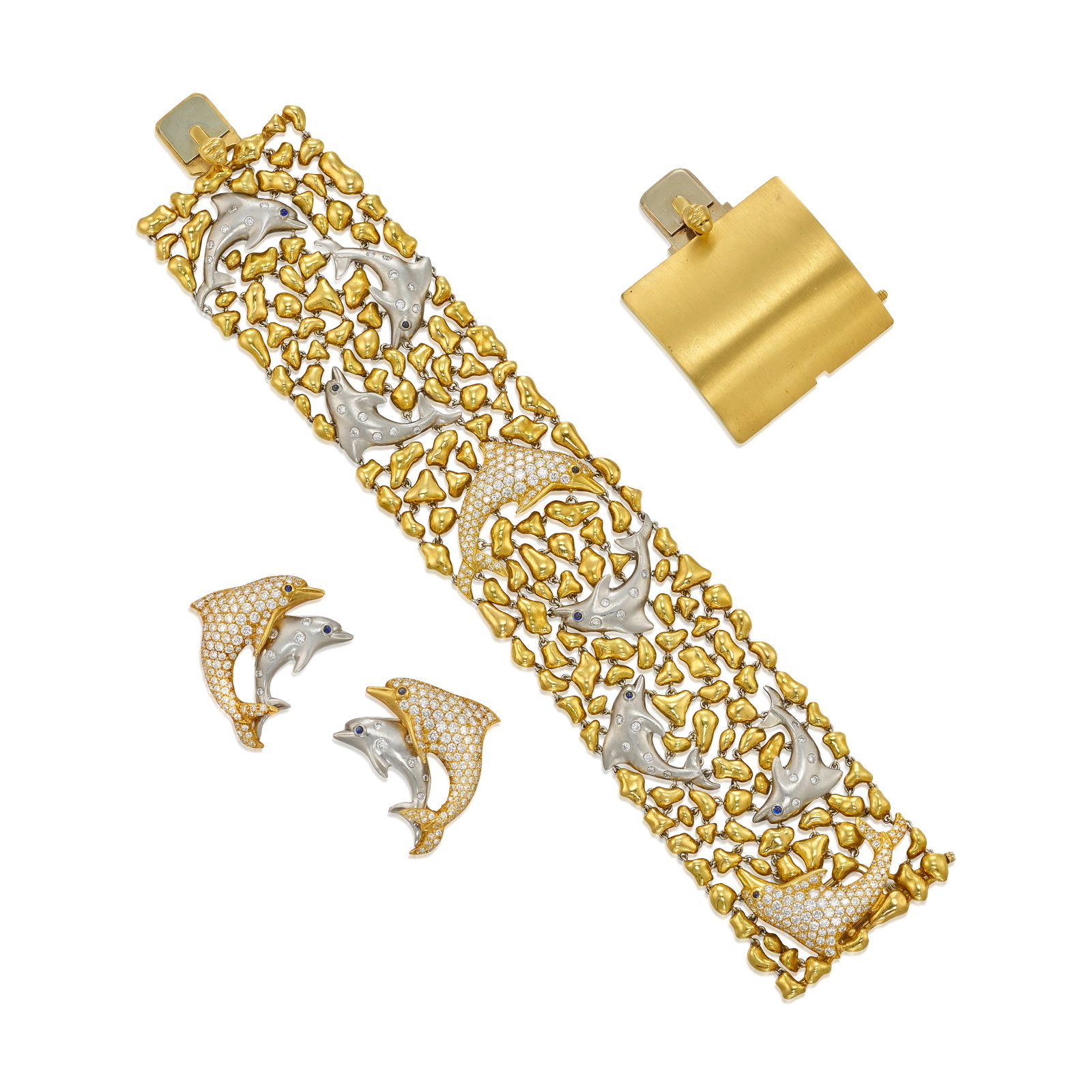 JULIUS COHEN: AN 18K GOLD, PLATINUM AND DIAMOND BRACELET AND EARCLIP SET (1 of 1)
