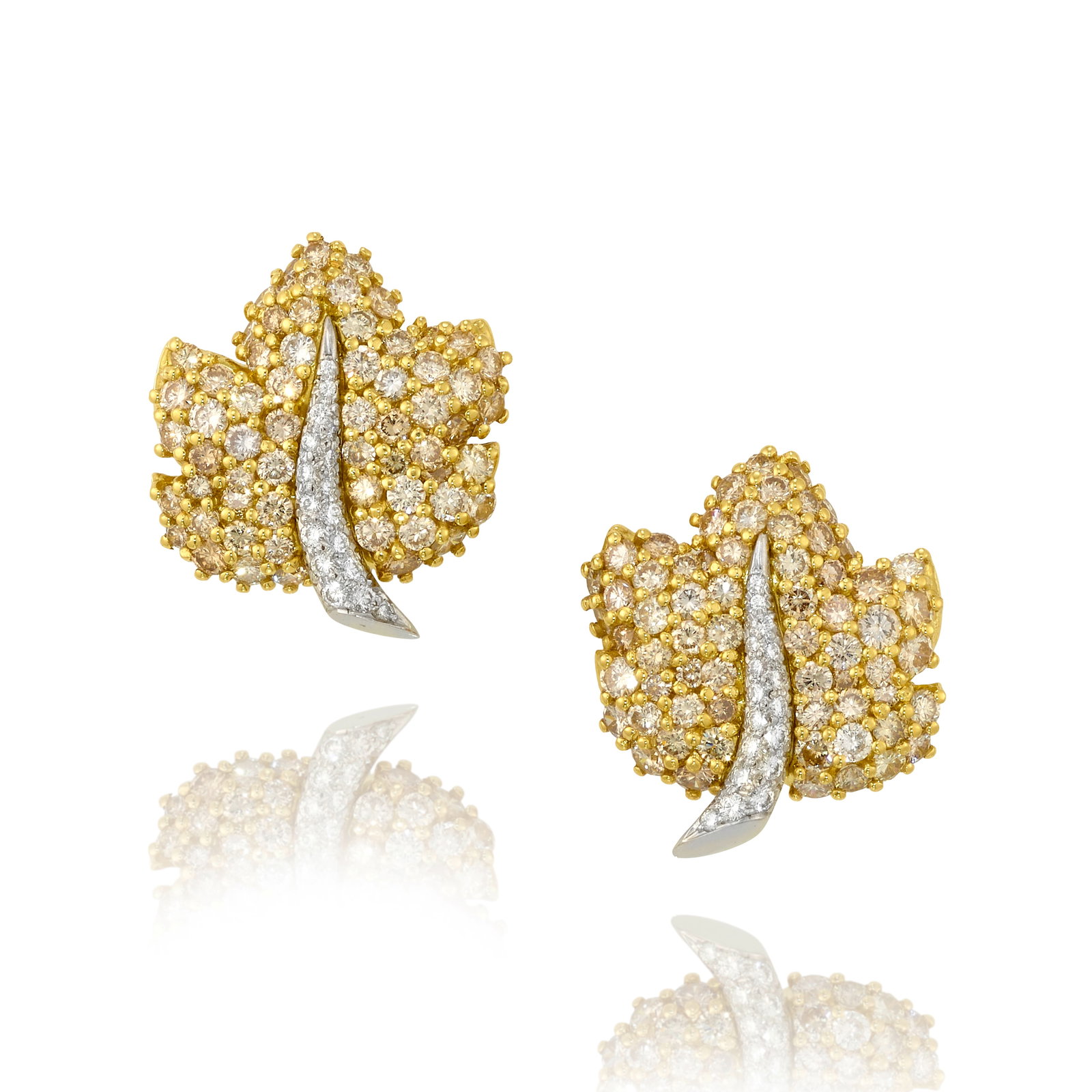 JEAN VITAU: A PAIR OF 18K GOLD, PLATINUM AND DIAMOND EARRINGS: JEAN VITAU: A PAIR OF 18K GOLD, PLATINUM AND DIAMOND EARRINGS Each of leaf design, accented by pavé-set round brilliant-cut diamonds; signed Jean Vitau; estimated total diamond weight 5.20 carats
