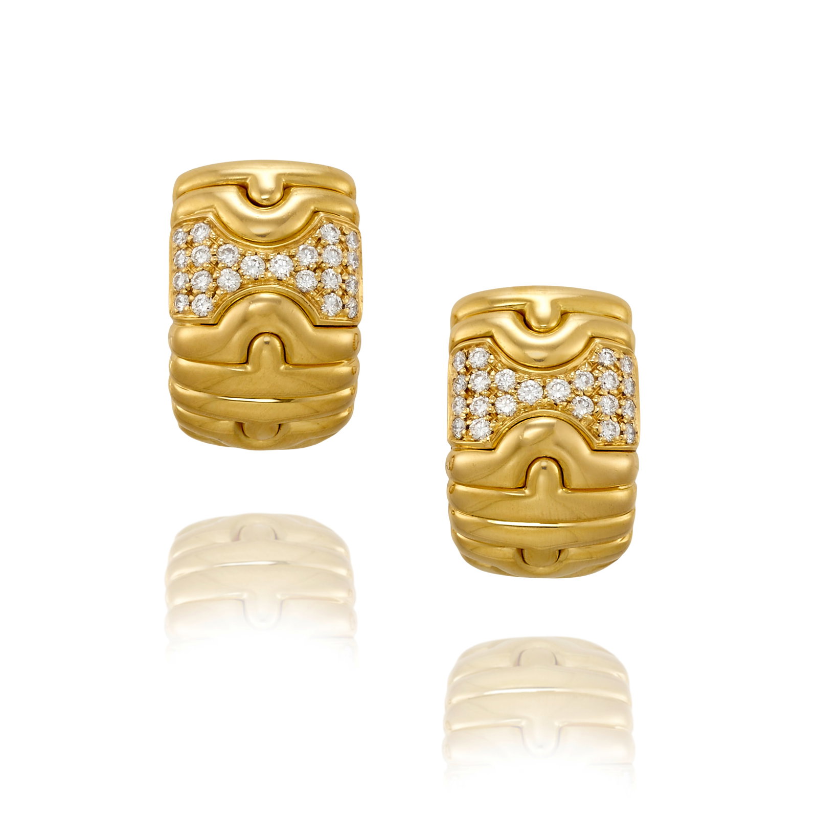 BULGARI: A PAIR OF 18K GOLD AND DIAMOND 'PARENTESI' EARRINGS: BULGARI: A PAIR OF 18K GOLD AND DIAMOND 'PARENTESI' EARRINGS Each of geometric design, accented by round brilliant-cut diamonds; signed Bulgari; with Italian registered trademarks; estimated total dia