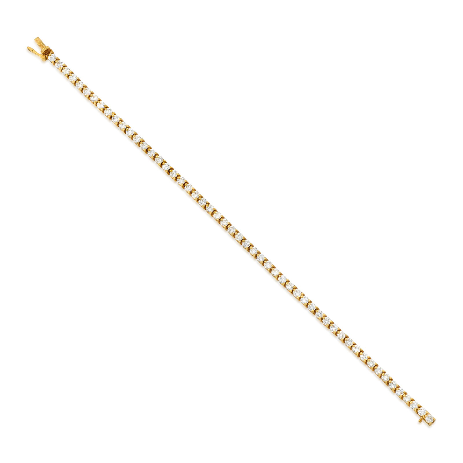 CARTIER: AN 18K GOLD AND DIAMOND BRACELET: CARTIER: AN 18K GOLD AND DIAMOND BRACELET A line bracelet, comprising round brilliant-cut diamonds; signed Cartier; with maker's marks; with serial number; with English hallmarks; with French assay ma
