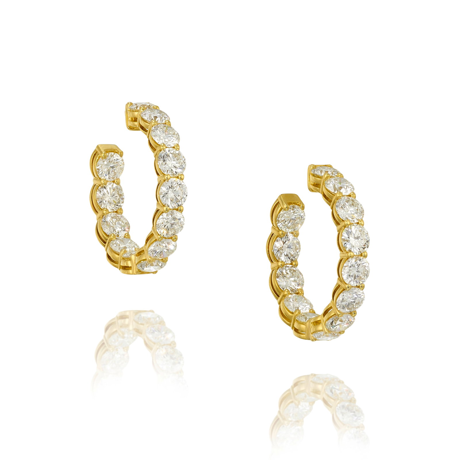 A PAIR OF DIAMOND EARRINGS: A PAIR OF DIAMOND EARRINGS Comprising round brilliant-cut diamonds, total weight 13.51 carats; mounted in 18k gold; measures 1 1/8 in. Footnotes: Accompanied by GIA Reports 6522095098, 7522644090, 650