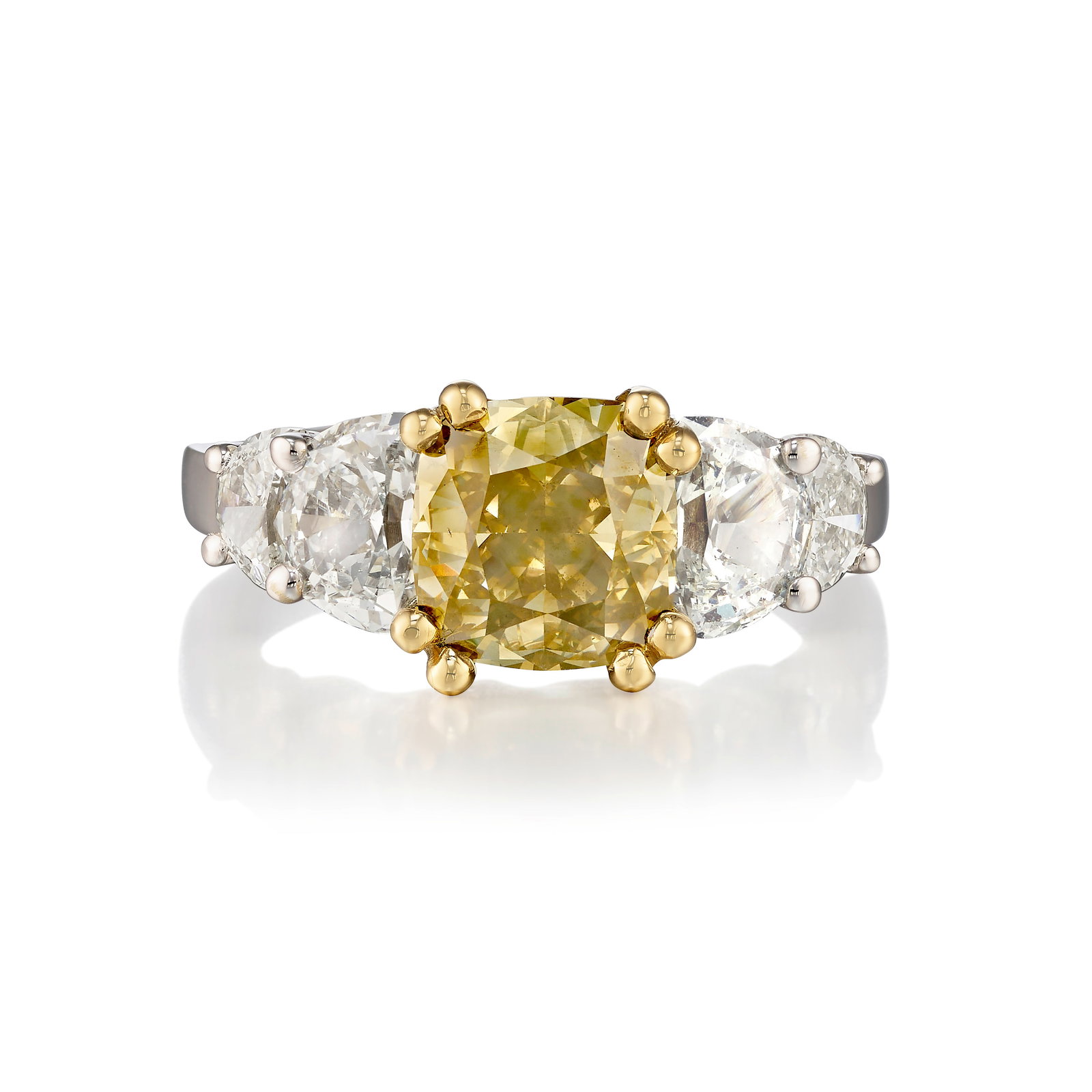 AN 18K BICOLOR GOLD, FANCY DARK BROWN-GREENISH YELLOW DIAMOND AND DIAMOND RING: AN 18K BICOLOR GOLD, FANCY DARK BROWN-GREENISH YELLOW DIAMOND AND DIAMOND RING Centering a cushion-shaped, modified brilliant-cut, Fancy Dark Brown-Greenish Yellow diamond, weighing 3.20 carats,