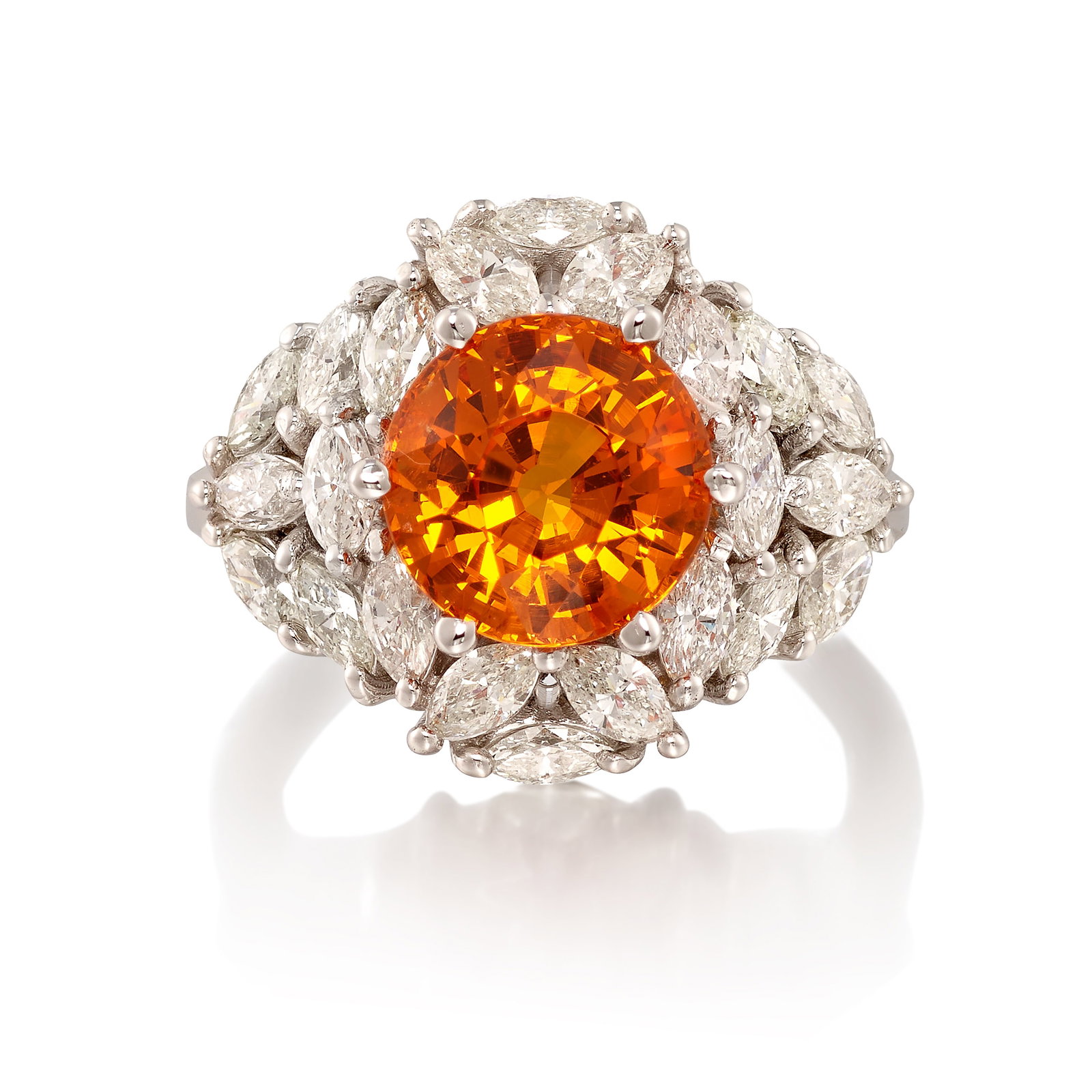 AN 18K WHITE GOLD, SPESSARTINE GARNET AND DIAMOND RING: AN 18K WHITE GOLD, SPESSARTINE GARNET AND DIAMOND RING Centering a round spessartine garnet, weighing 5.24 carats, mounted in a cluster of marquise-shaped diamonds; estimated total diamond weight