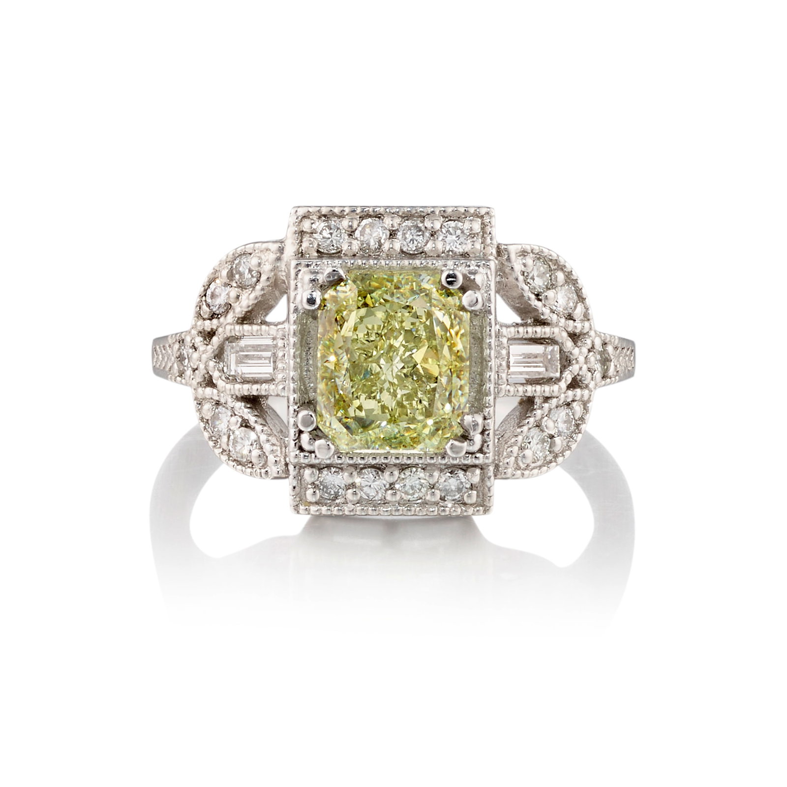 A PLATINUM AND DIAMOND RING: A PLATINUM AND DIAMOND RING Centering a cushion-shaped diamond, in a surround of round brilliant and baguette-cut diamonds; estimated center diamond weight 2.00 carats; estimated remaining diamond