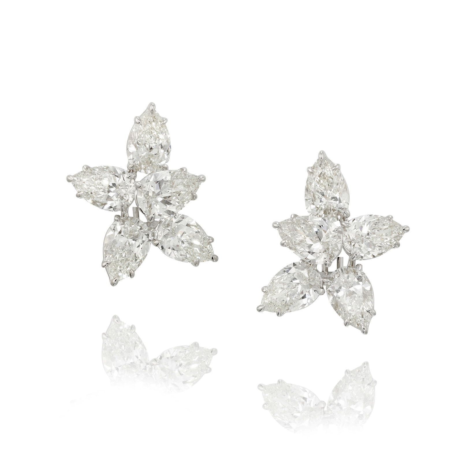 A PAIR OF DIAMOND EARRINGS: A PAIR OF DIAMOND EARRINGS Each of cluster design, comprising pear-shaped diamonds, total weight 10.04 carats; mounted in 18k white gold; measures 7/8 x 5/8 in. Footnotes: Accompanied by GIA Reports