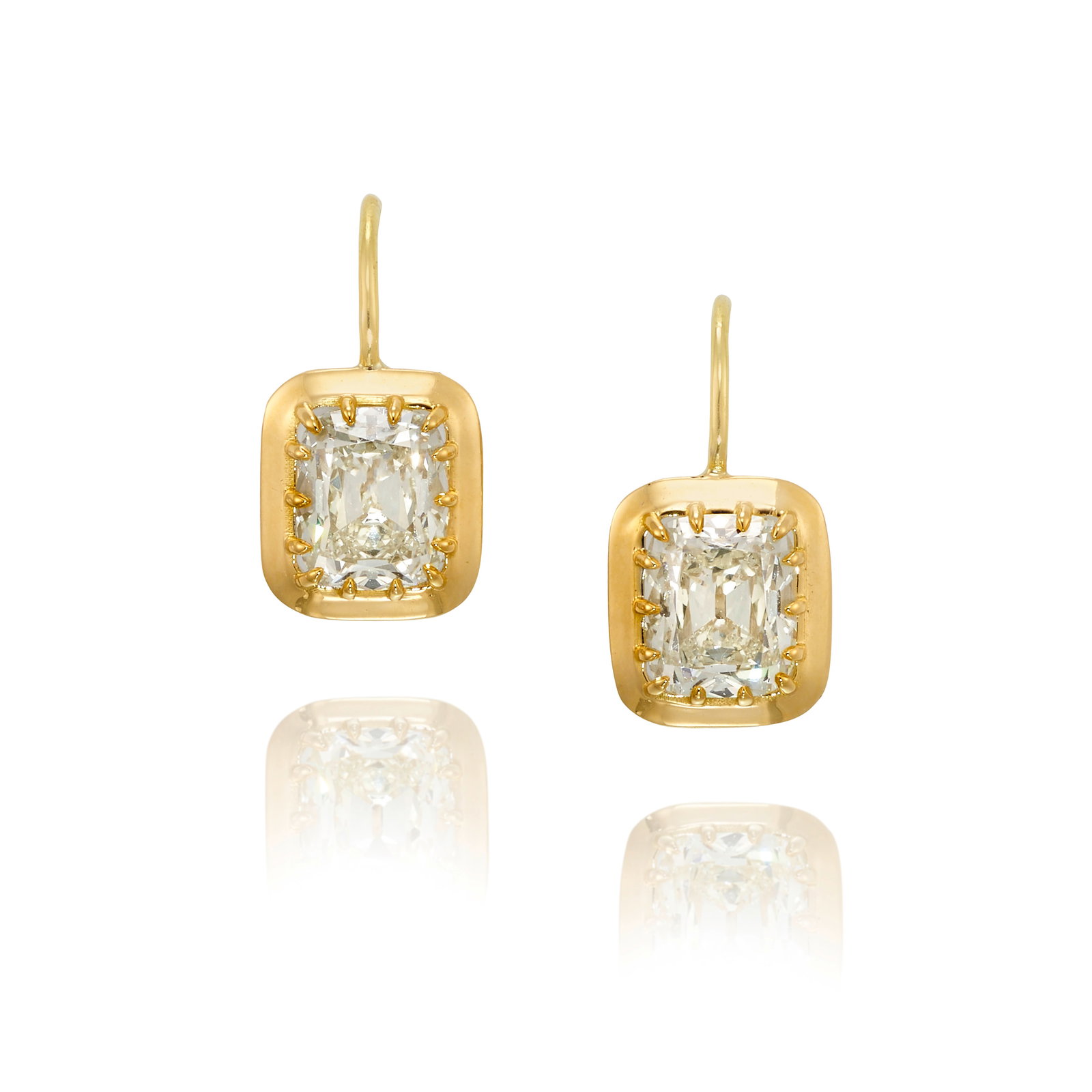 A PAIR OF 18K GOLD AND DIAMOND EARRINGS: A PAIR OF 18K GOLD AND DIAMOND EARRINGS Each suspending old mine-cut diamonds weighing 1.51 carats, respectively; measures 5/8 x 5/16 in. Footnotes: Accompanied by GIA Report 1236766843, dated