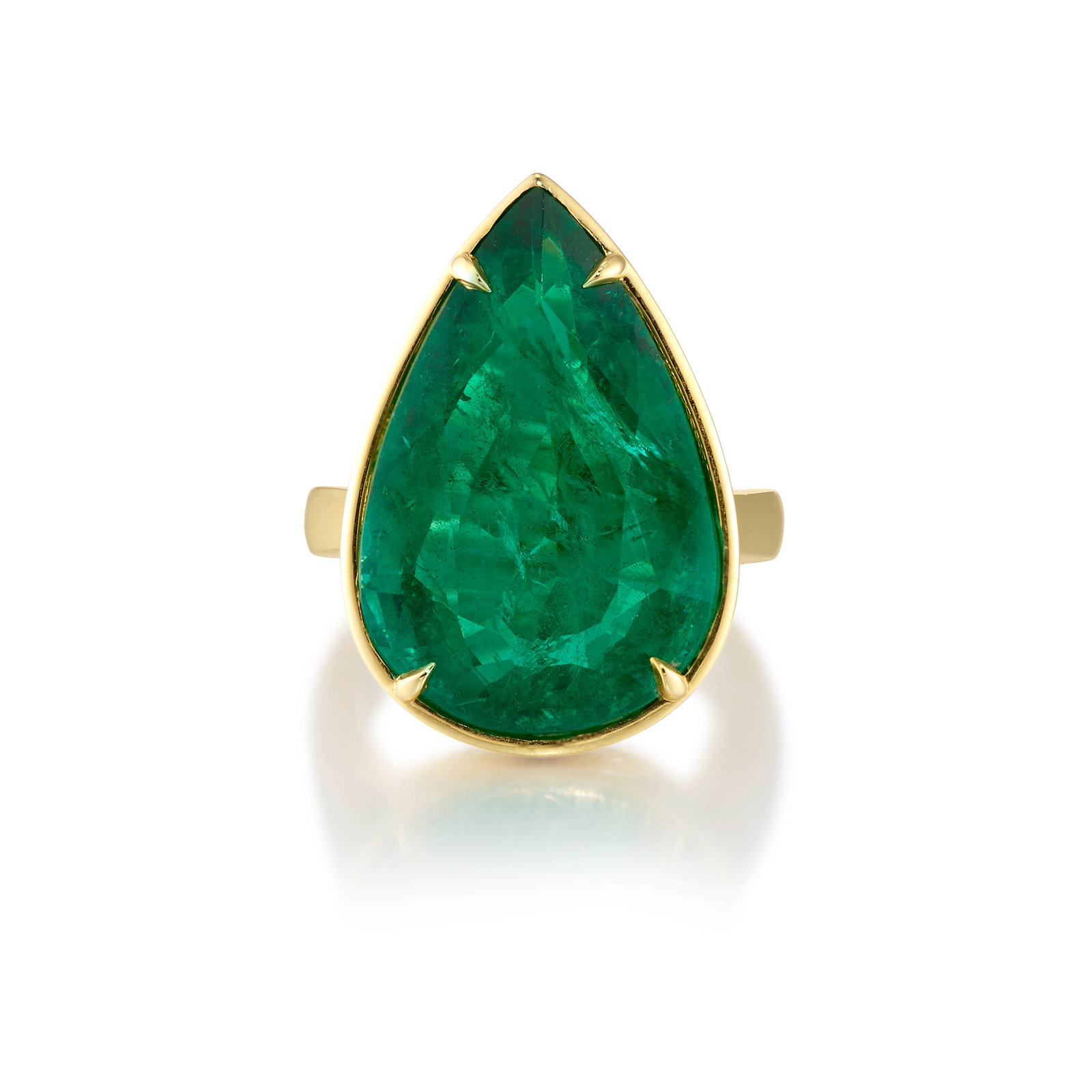 AN 18K GOLD AND EMERALD RING: AN 18K GOLD AND EMERALD RING Centering a pear-shaped emerald; estimated emerald weight 18.30 carats; size 6 1/4 Footnotes: Emerald is not accompanied by a report or certificate from a gemological labo