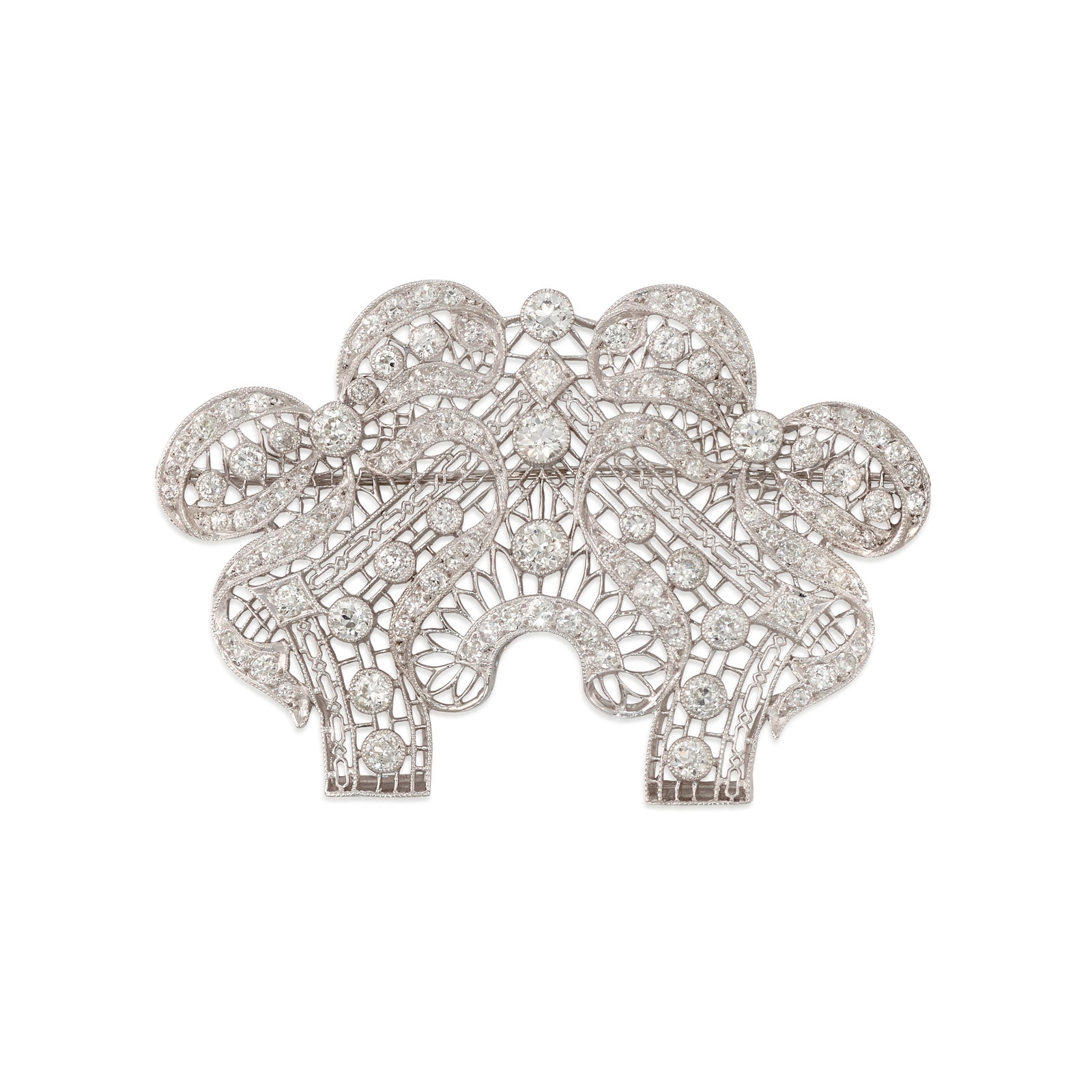 A DIAMOND BROOCH, CIRCA 1910: A DIAMOND BROOCH, CIRCA 1910 Of ornate, openwork design, set across with old European, old mine and single-cut diamonds; estimated total diamond weight 4.95 carats; mounted in white gold-plated