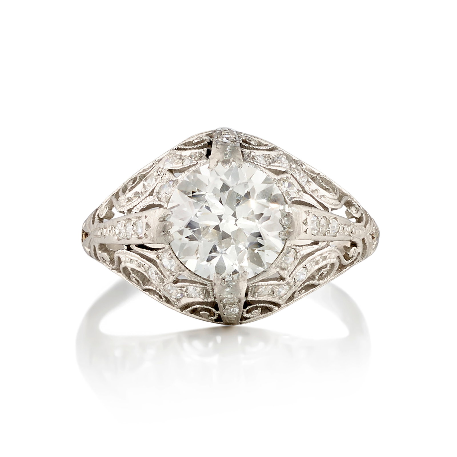 A DIAMOND RING, CIRCA 1920: A DIAMOND RING, CIRCA 1920 Centering a round brilliant-cut diamond, weighing 1.90 carats, in an openwork mounting accented with single-cut diamonds; mounted in platinum; size 6 Footnotes: Accompanied