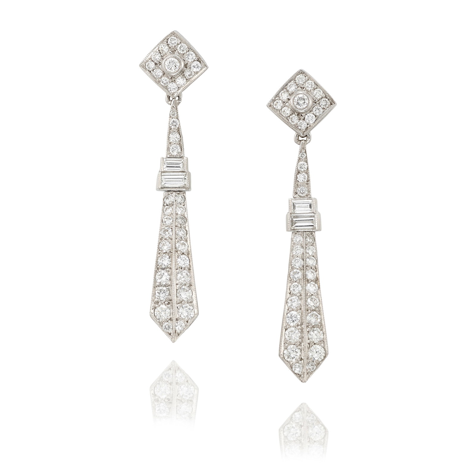 A PAIR OF 18K WHITE GOLD AND DIAMOND EARCLIPS: A PAIR OF 18K WHITE GOLD AND DIAMOND EARCLIPS Comprising round brilliant and baguette-cut diamonds, with hidden pendant wires; estimated total diamond weight 2.75 carats; measures 1 15/16 x 7/16 in.