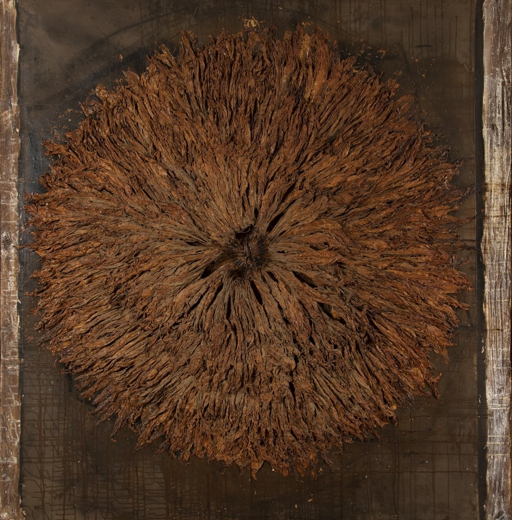 PANOS CHARALAMBOUS (born 1956) Sans titre: PANOS CHARALAMBOUS (born 1956) Sans titre signé et daté « P. CHARALAMBOUS 88 » (sur le châssis) feuilles de tabac et technique mixte sur toile 180 x 180 cm. (70.9 × 70.9 