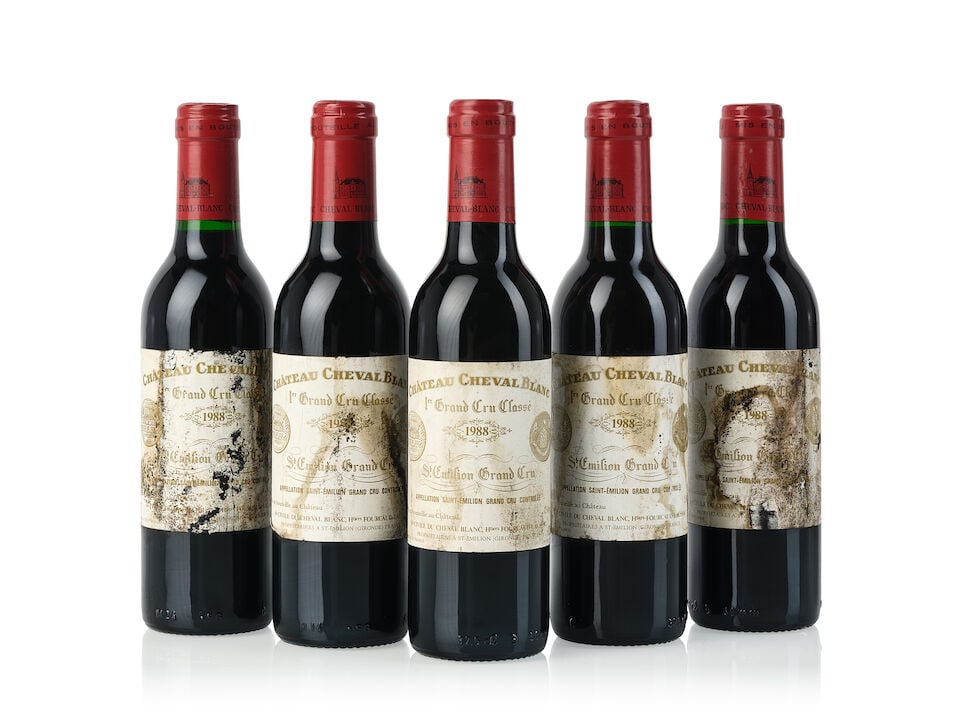 Château Cheval Blanc, 1988 (5x 375ml): Château Cheval Blanc, 1988 (5x 375ml) Region: Bordeaux Fill Level: 5x into neck Cork: 1x slightly depressed cork Label: 3x deteriorated, 2x heavily damp-stained, 2x heavily bin-soiled For further