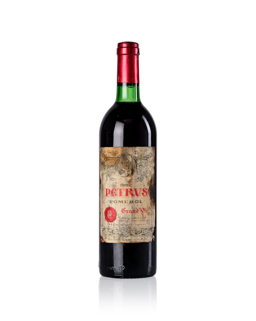 Pétrus, 1982 (1x 750ml): Pétrus, 1982 (1x 750ml) Region: Bordeaux Fill Level: base neck Capsule: slight scuffed and slightly nicked Cork: slightly depressed Label: deteriorated For further information on this lot please 