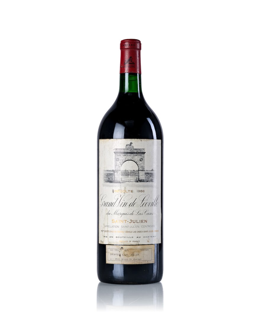Château Léoville Las Cases, 1986 (1x Magnum): Château Léoville Las Cases, 1986 (1x Magnum) Region: Bordeaux Fill Level: base neck Capsule: slightly scuffed Label: stained, bin-soiled and scuffed For further information on this lot pleas
