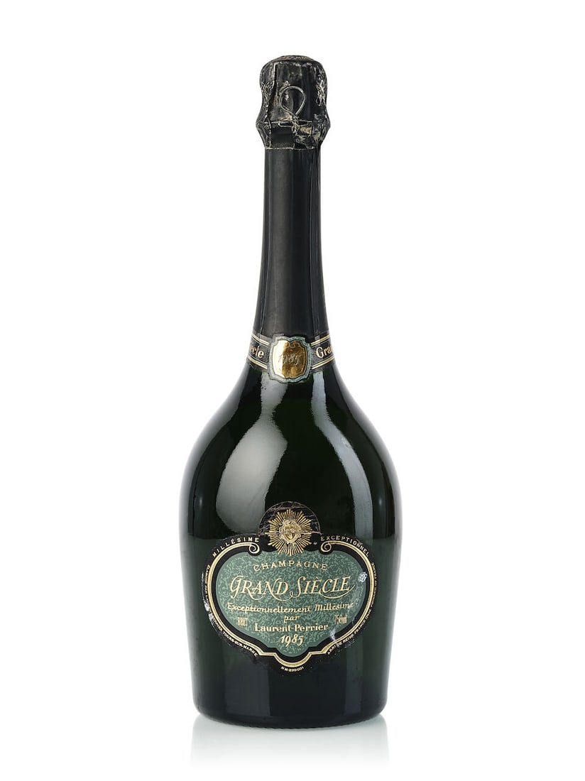Laurent Perrier Grand Siècle, 1985 (1x 750ml): Laurent Perrier Grand Siècle, 1985 (1x 750ml) Region: Champagne Fill Level: 1cm inverted Capsule: corroded Label: slightly wrinkled, stained For further information on this lot please visit Bonha