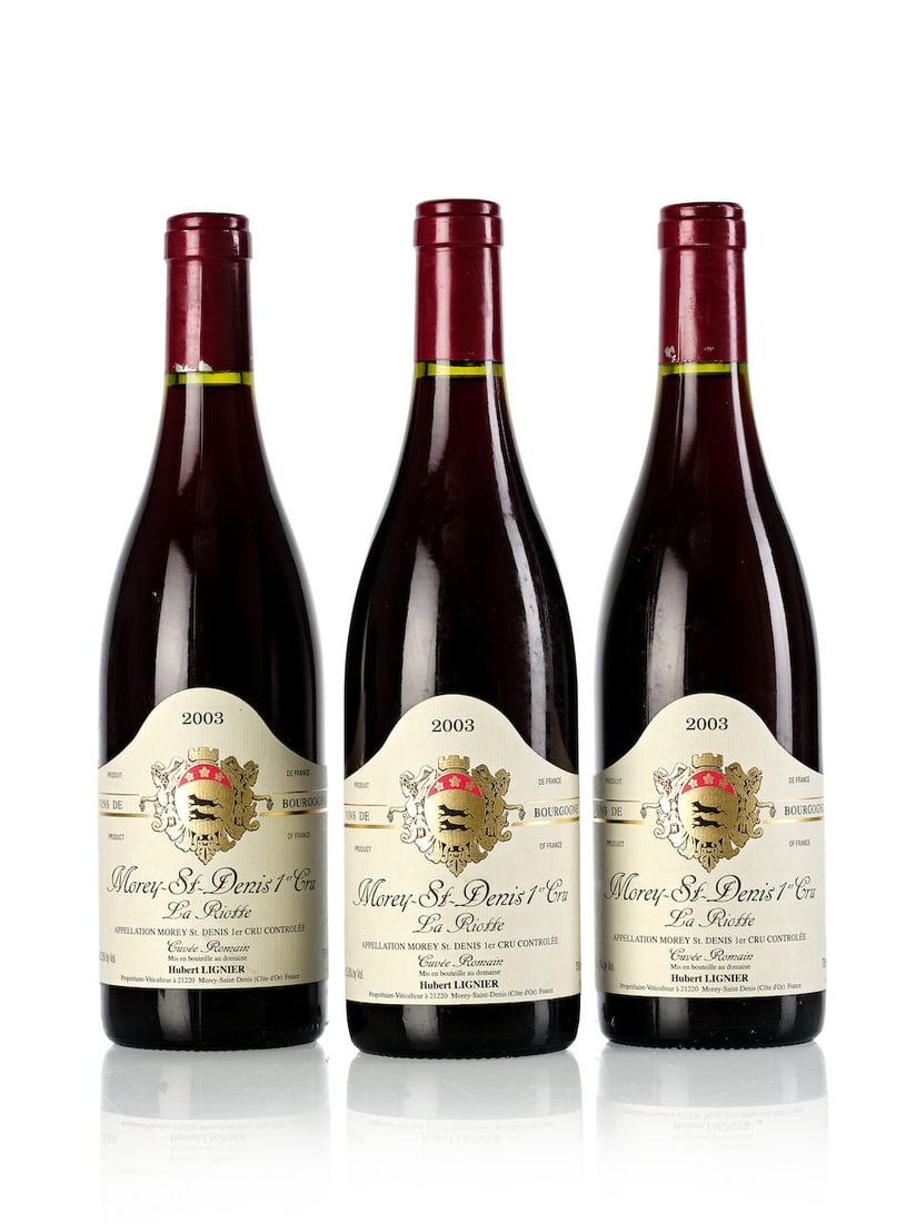Domaine Hubert Lignier Morey St. Denis La Riotte Cuvée Romain, 2003 (3x 750ml): Domaine Hubert Lignier Morey St. Denis La Riotte Cuvée Romain, 2003 (3x 750ml) Region: Burgundy Capsule: 2x slightly scuffed Label: 1x wrinkled For further information on this lot please visit