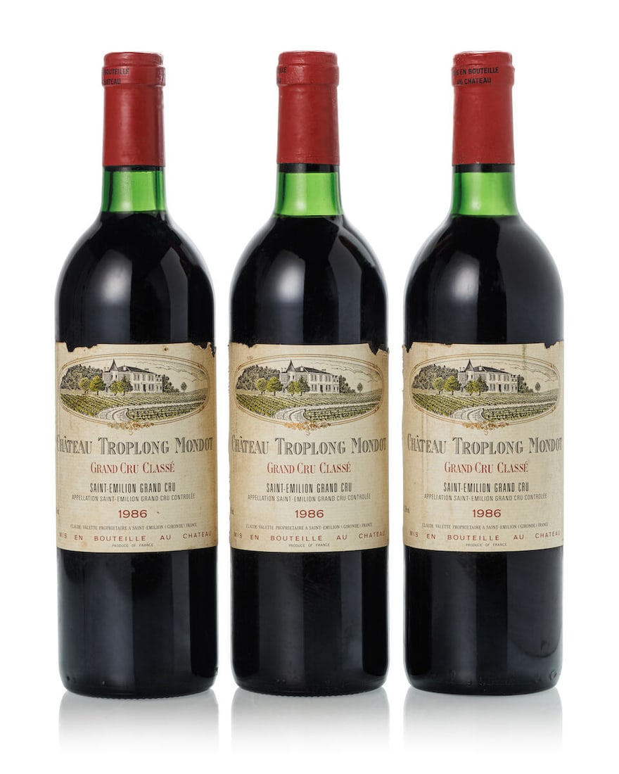 Château Troplong Mondot, 1986 (8x 750ml): Château Troplong Mondot, 1986 (8x 750ml) Region: Bordeaux Fill Level: 1x into neck, 3x base neck, 4x very top shoulder Capsule: 8x slightly torn and 8x bin-soiled Cork: 6x slightly