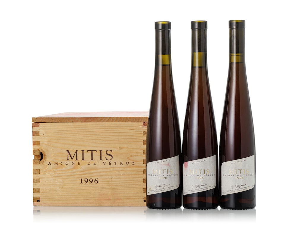 Mitis, 1996 (6x 375ml): Mitis, 1996 (6x 375ml) Region: Switzerland Fill Level: 2x 2.5cm, 4x 1.5cm Label: 1x slightly stained, 1x stained Lot to be sold without reserve. For further information on this lot please visit
