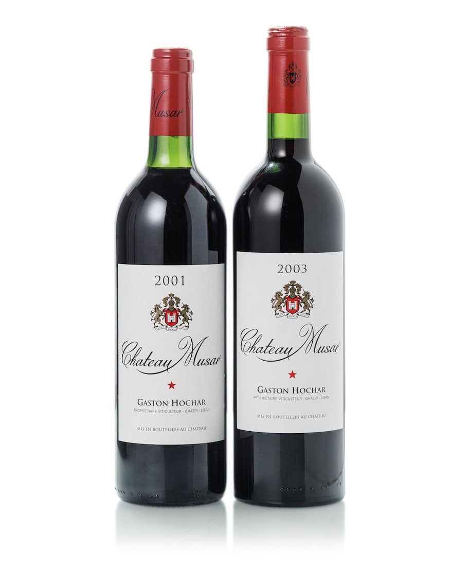 Château Musar Red, 2001 (4x 750ml) Château Musar Red, 2003 (7x 750ml): Château Musar Red, 2001 (4x 750ml) Region: Lebannon Cork: 4x signs of old seepage Château Musar Red, 2003 (7x 750ml) Region: Lebannon Cork: 2x signs of old seepage Lot to be sold without res
